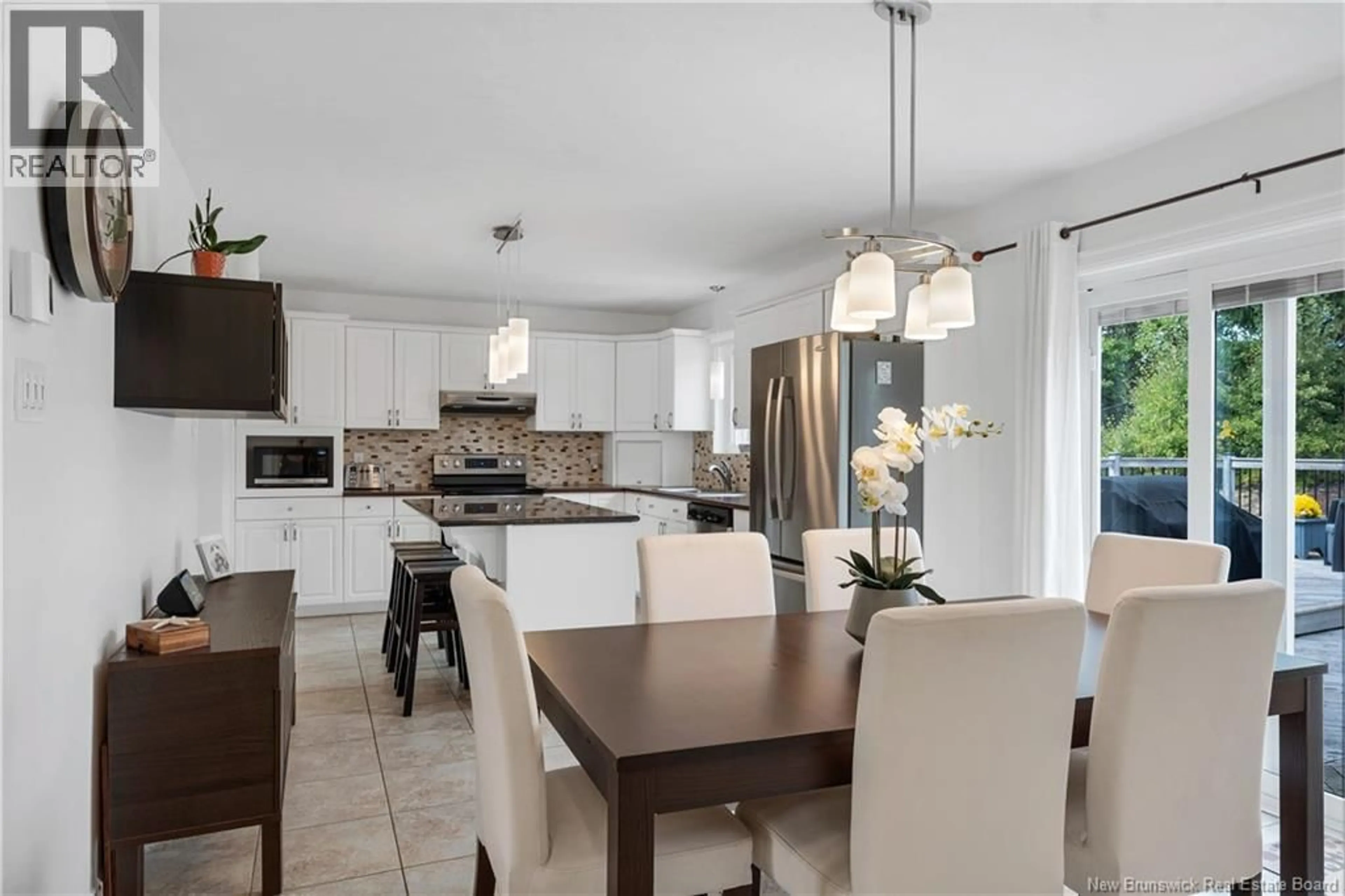 Open concept kitchen, ceramic/tile floor for 409 GASPE STREET, Dieppe New Brunswick E1A6V8