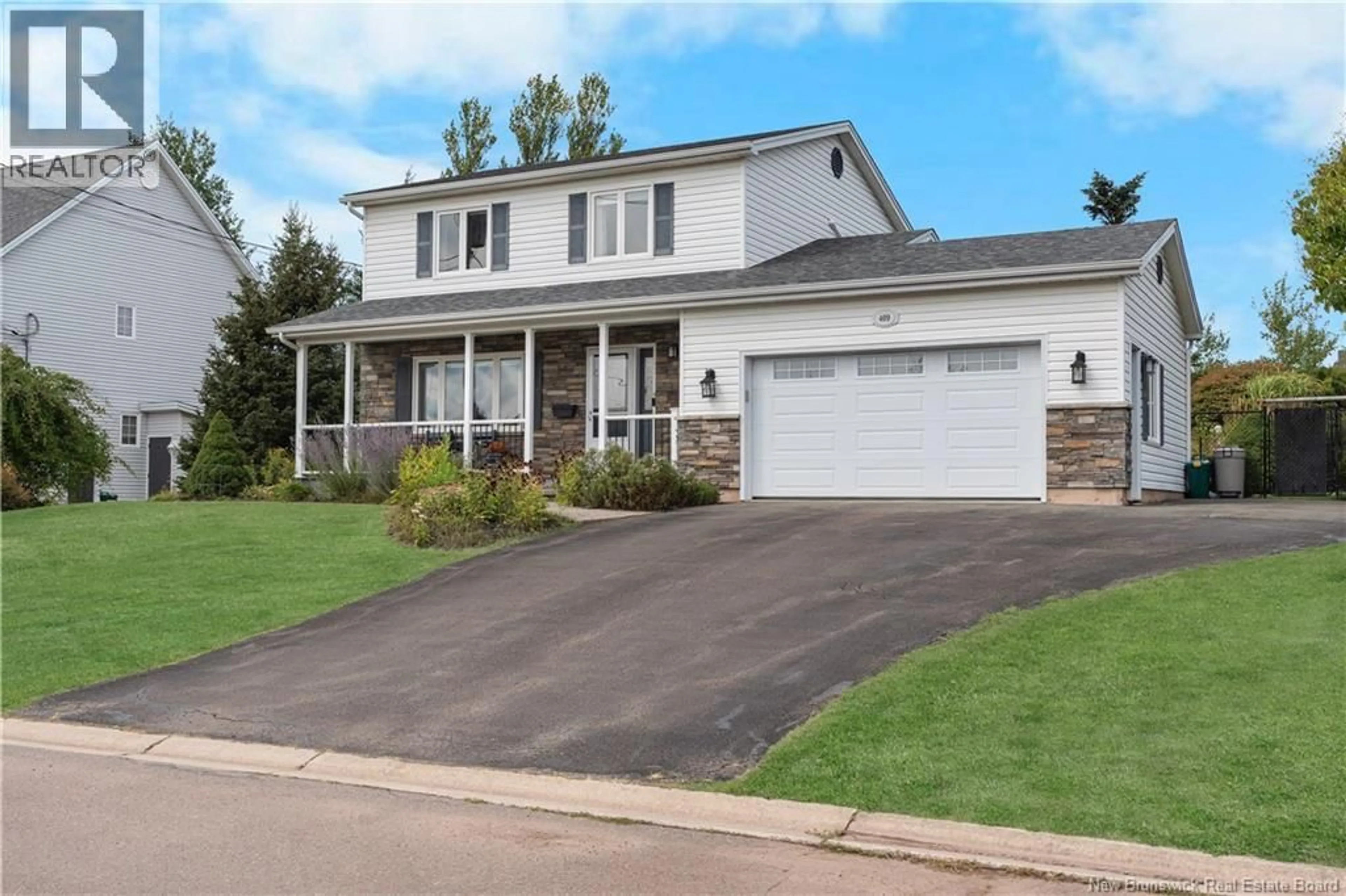 Home with vinyl exterior material, street for 409 GASPE STREET, Dieppe New Brunswick E1A6V8