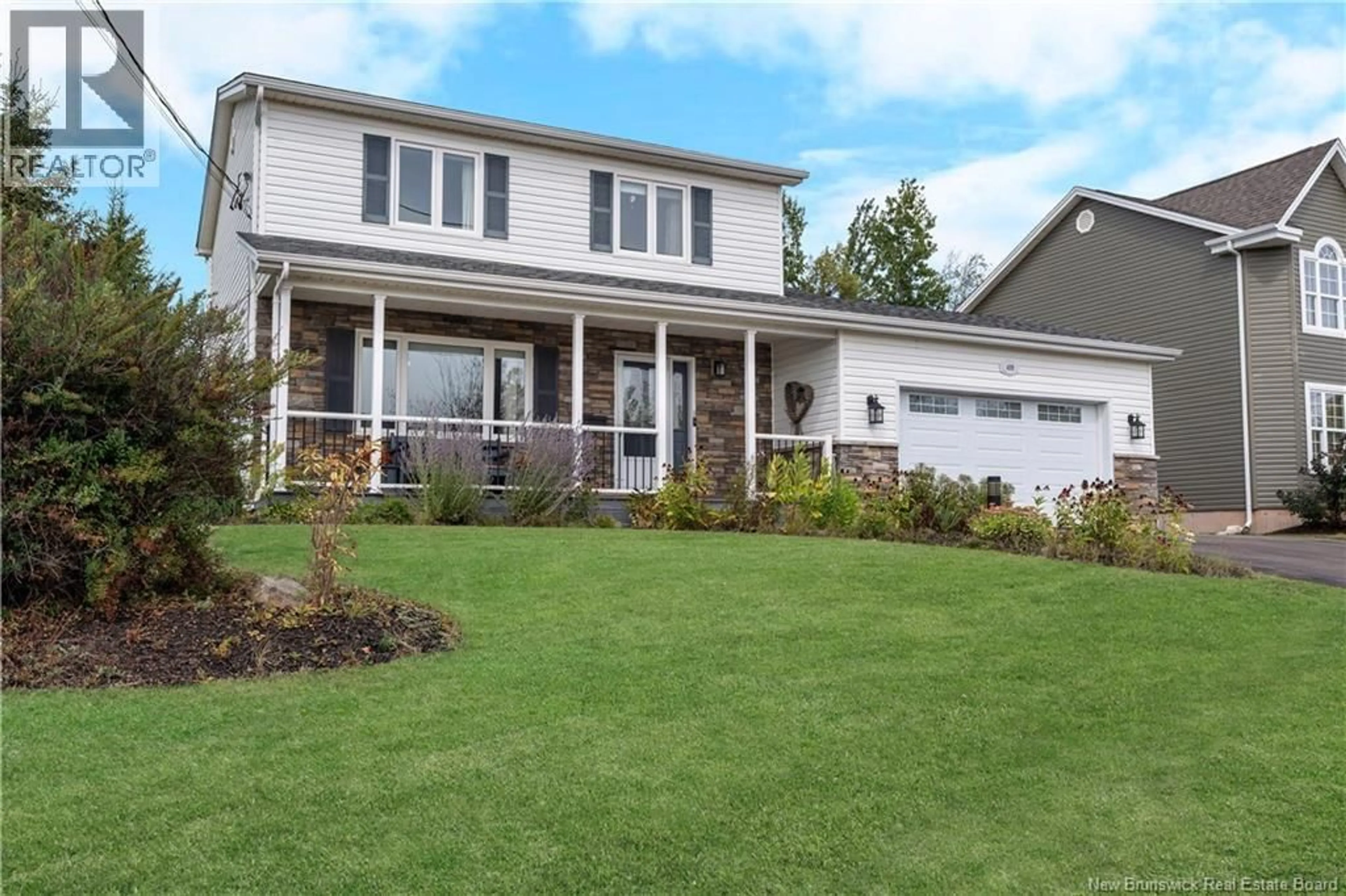 Home with vinyl exterior material, street for 409 GASPE STREET, Dieppe New Brunswick E1A6V8