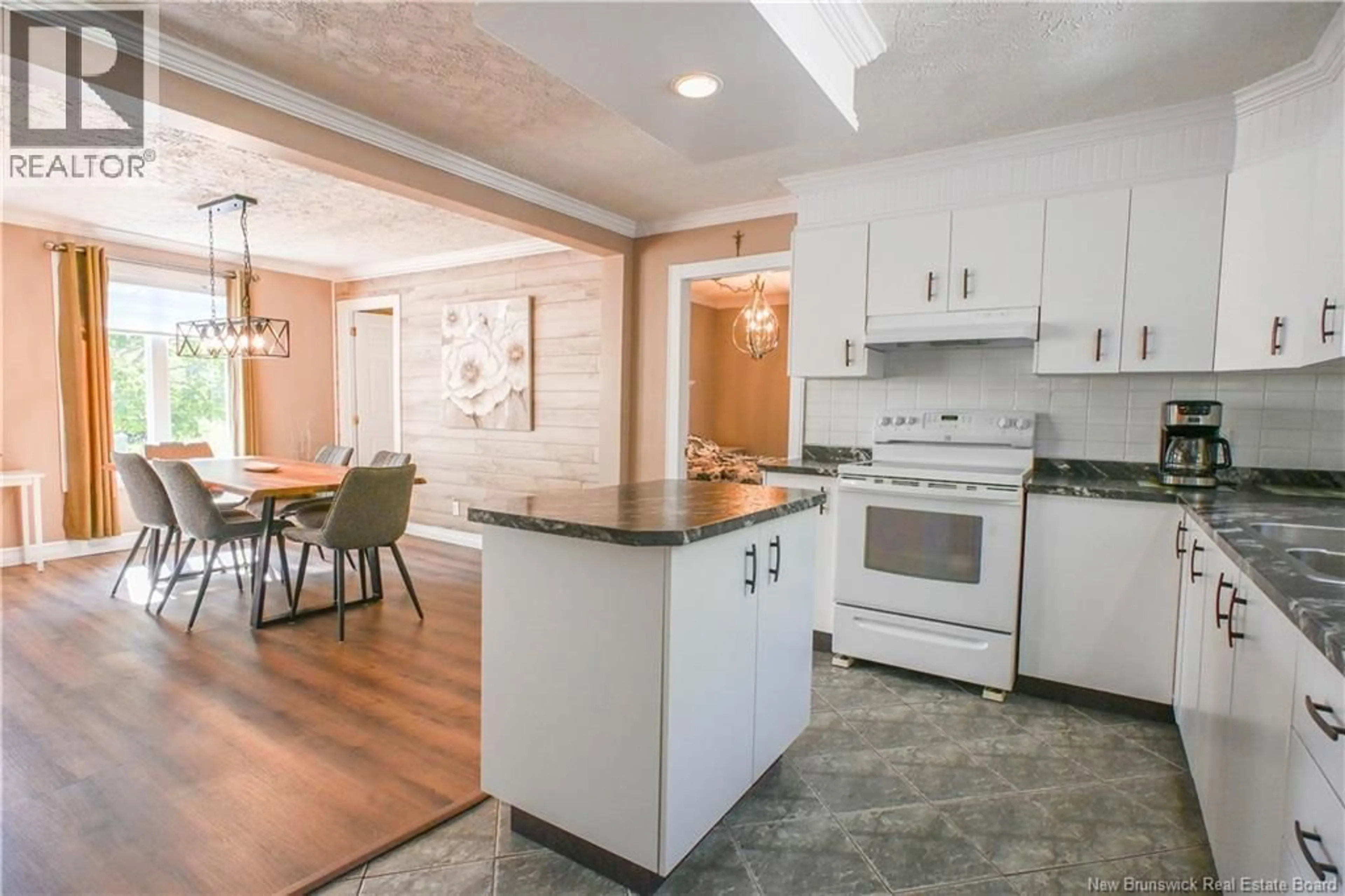 Open concept kitchen, ceramic/tile floor for 284 RUE DU PÊCHEUR N STREET, Lamèque New Brunswick E8T1K3
