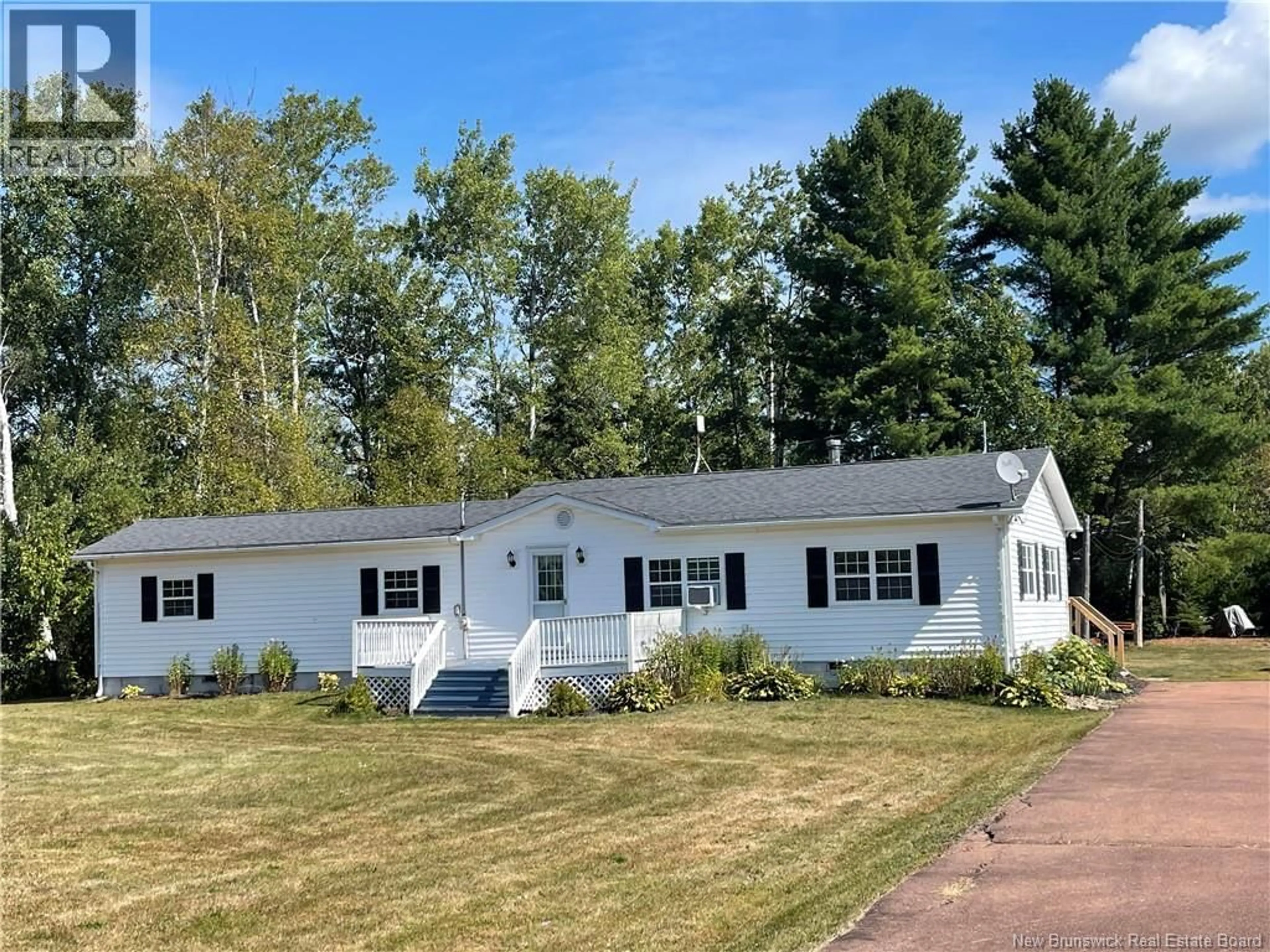 Home with vinyl exterior material, street for 10543 126 ROUTE, Acadie Siding New Brunswick E4Y2L3