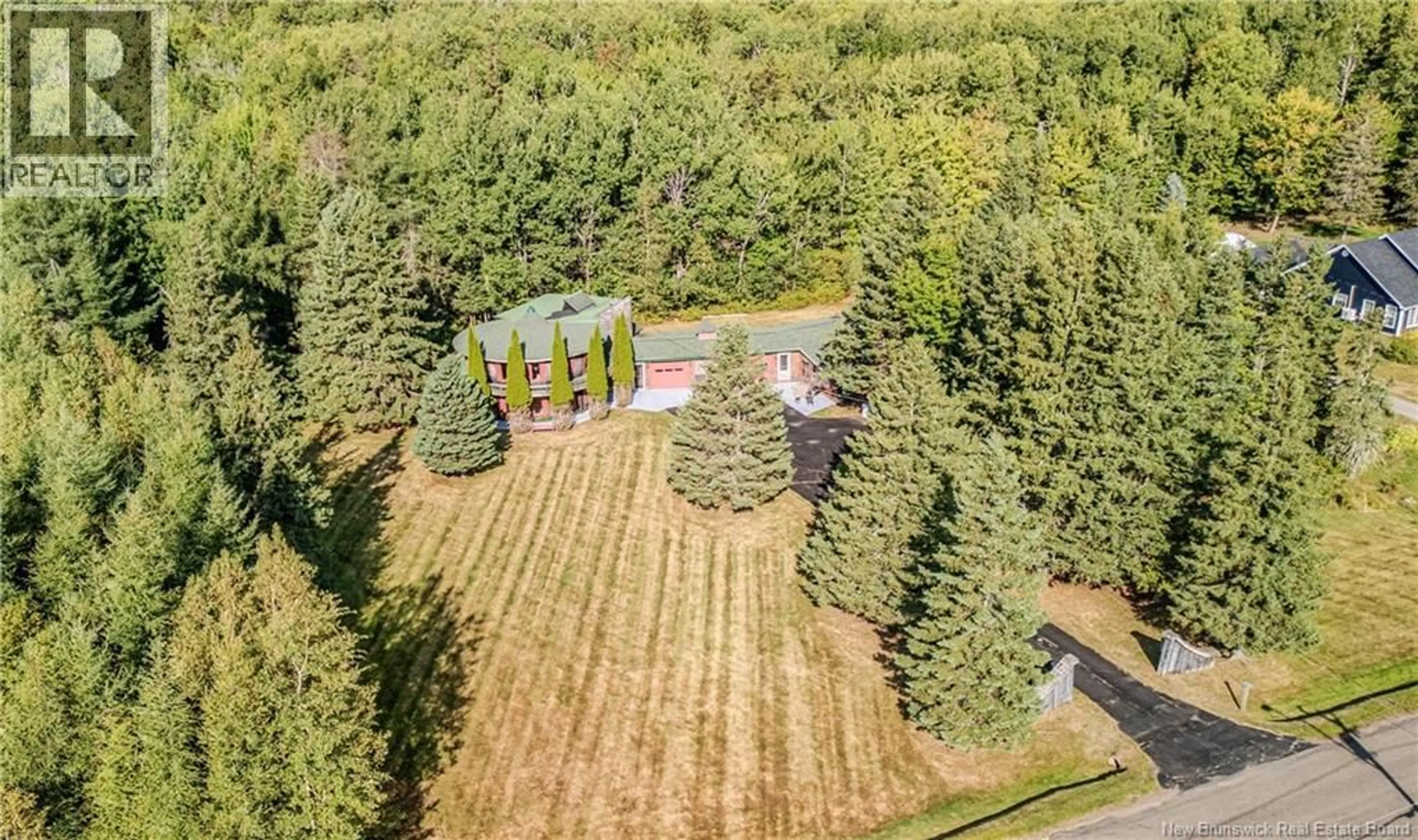 A pic from outside/outdoor area/front of a property/back of a property/a pic from drone, forest/trees view for 60 WHITE SETTLEMENT ROAD, Cocagne New Brunswick E4R3P3