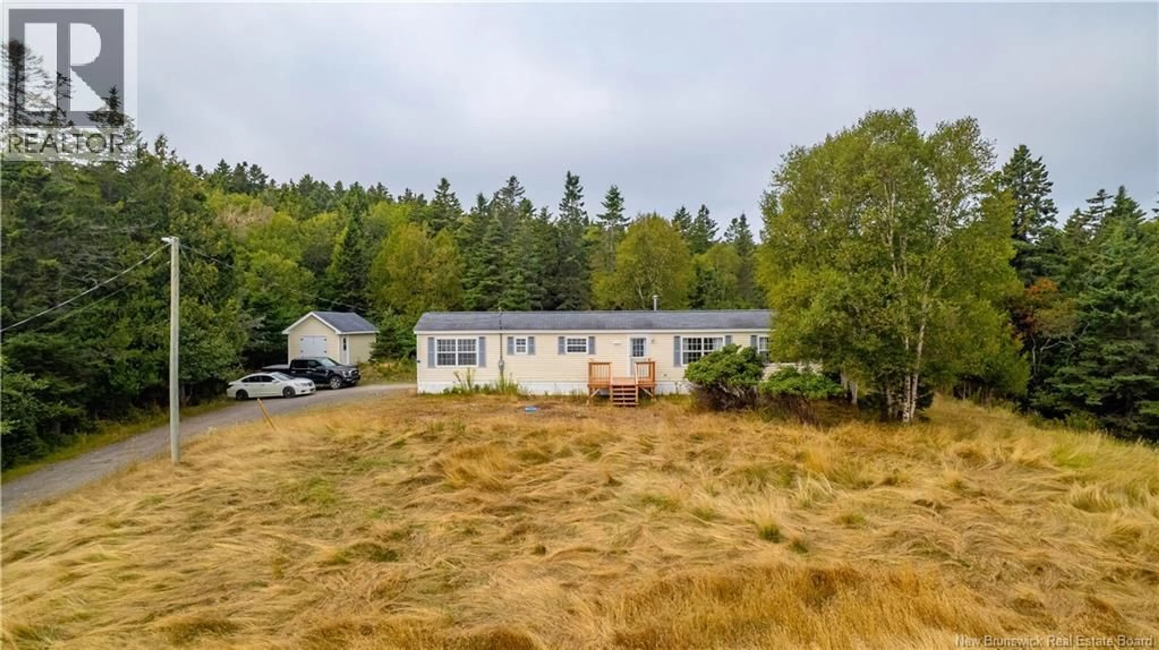 A pic from outside/outdoor area/front of a property/back of a property/a pic from drone, water/lake/river/ocean view for 22 772 ROUTE, Stuart Town New Brunswick E5V1J4