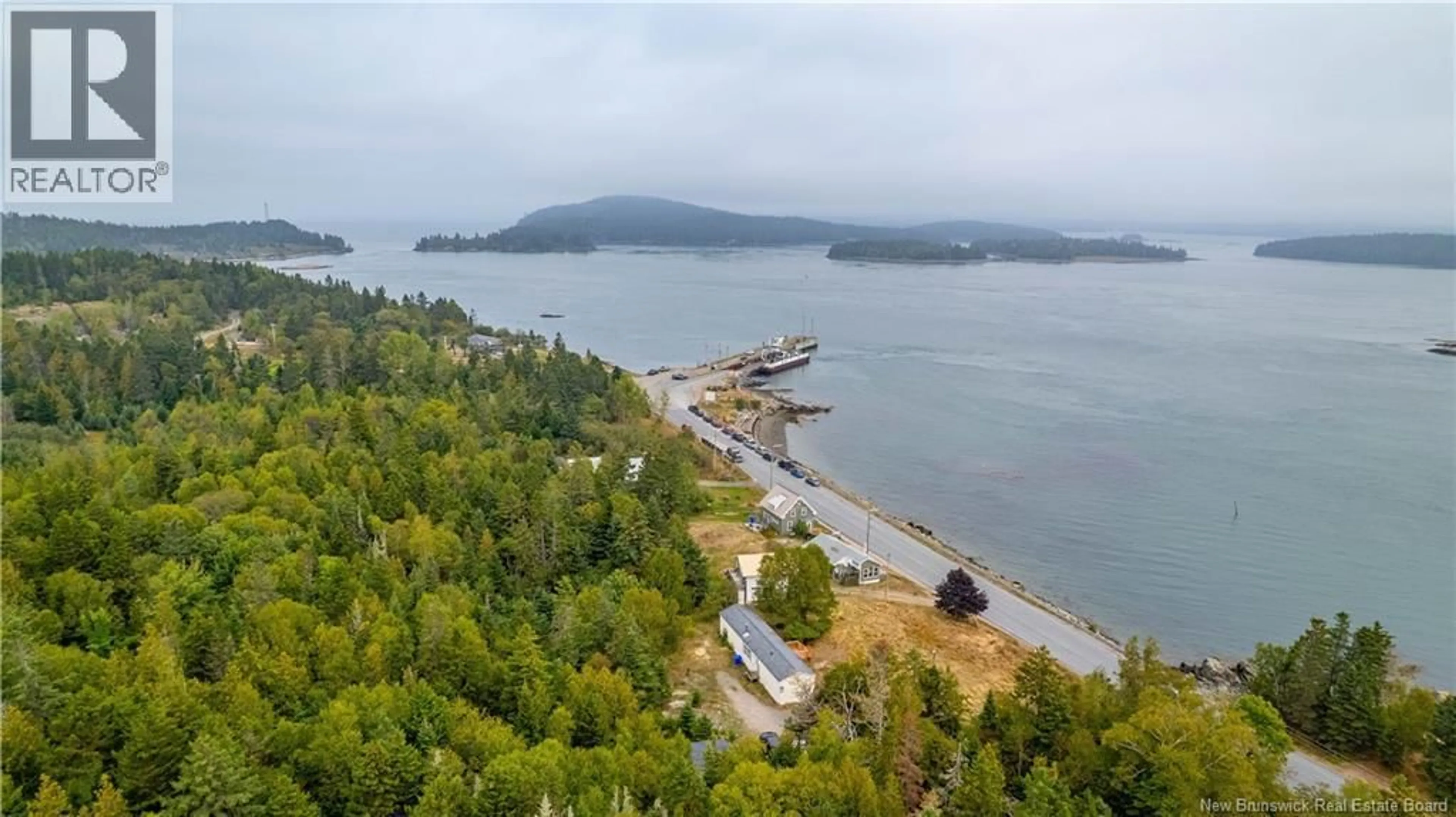 A pic from outside/outdoor area/front of a property/back of a property/a pic from drone, water/lake/river/ocean view for 22 772 ROUTE, Stuart Town New Brunswick E5V1J4