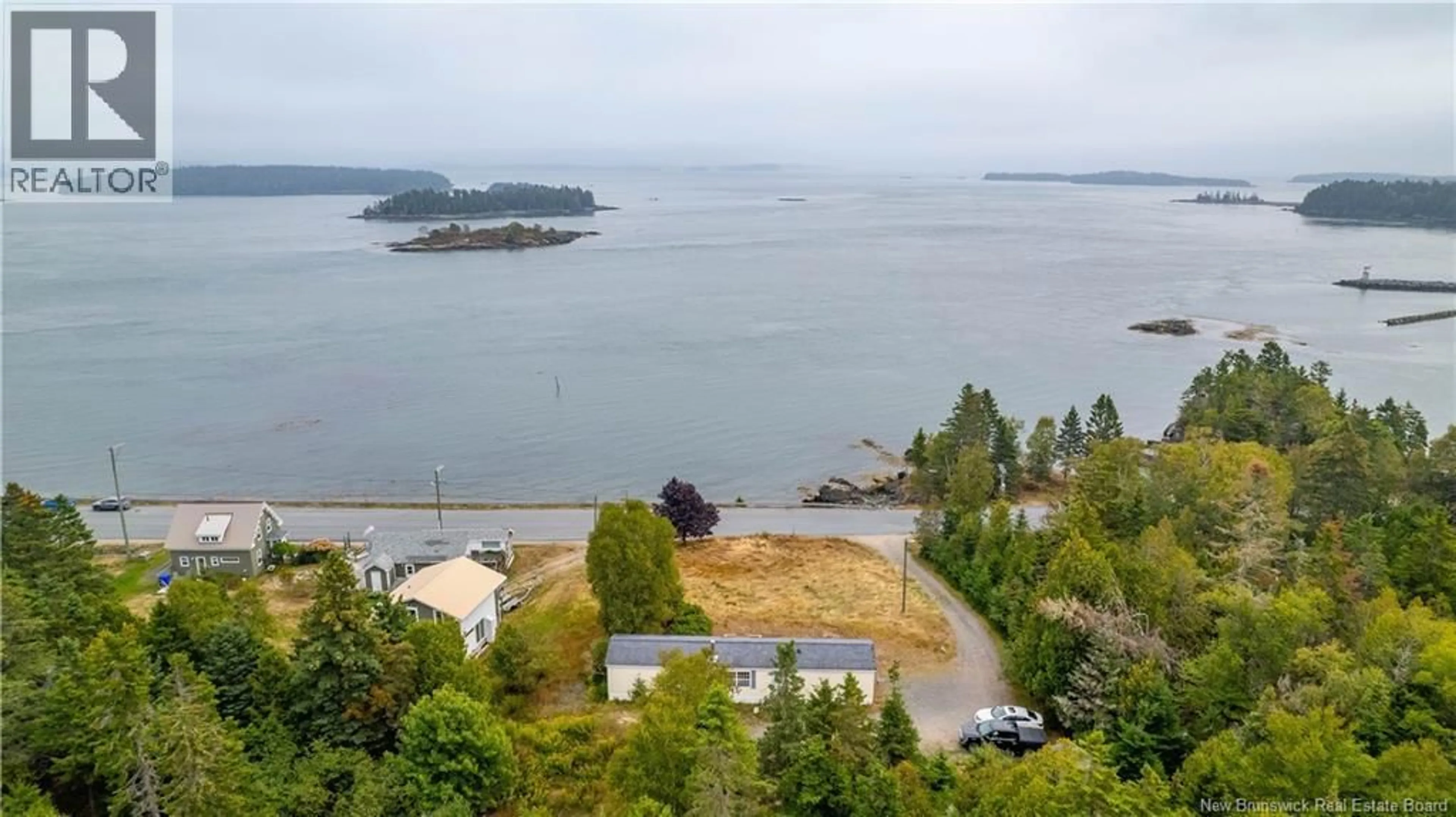 A pic from outside/outdoor area/front of a property/back of a property/a pic from drone, water/lake/river/ocean view for 22 772 ROUTE, Stuart Town New Brunswick E5V1J4