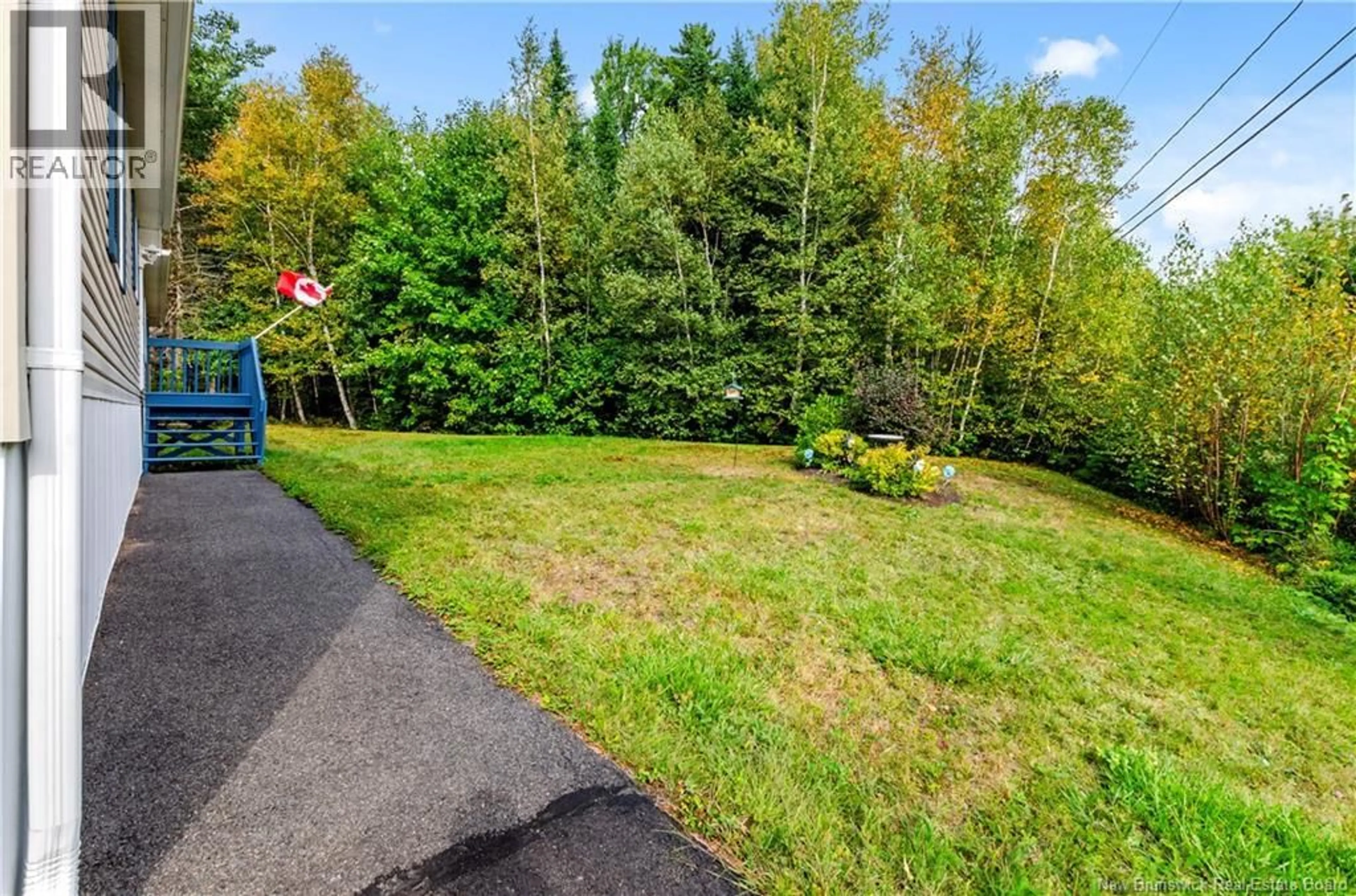 A pic from outside/outdoor area/front of a property/back of a property/a pic from drone, forest/trees view for 94 MCCAIN DRIVE, Waasis New Brunswick E3B9T3