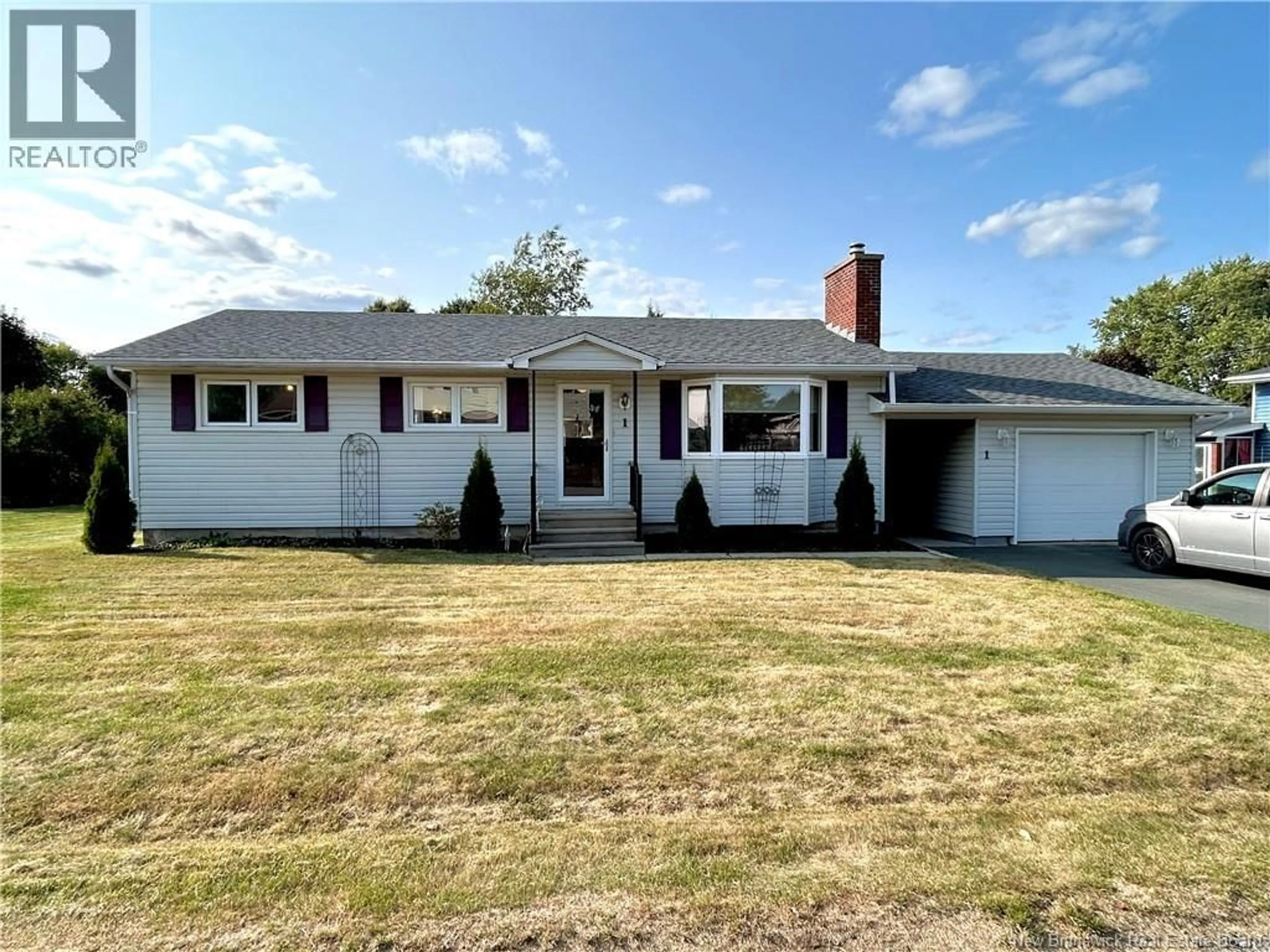 Home with vinyl exterior material, street for 1 VANSTONE AVENUE, Miramichi New Brunswick E1N1Y2