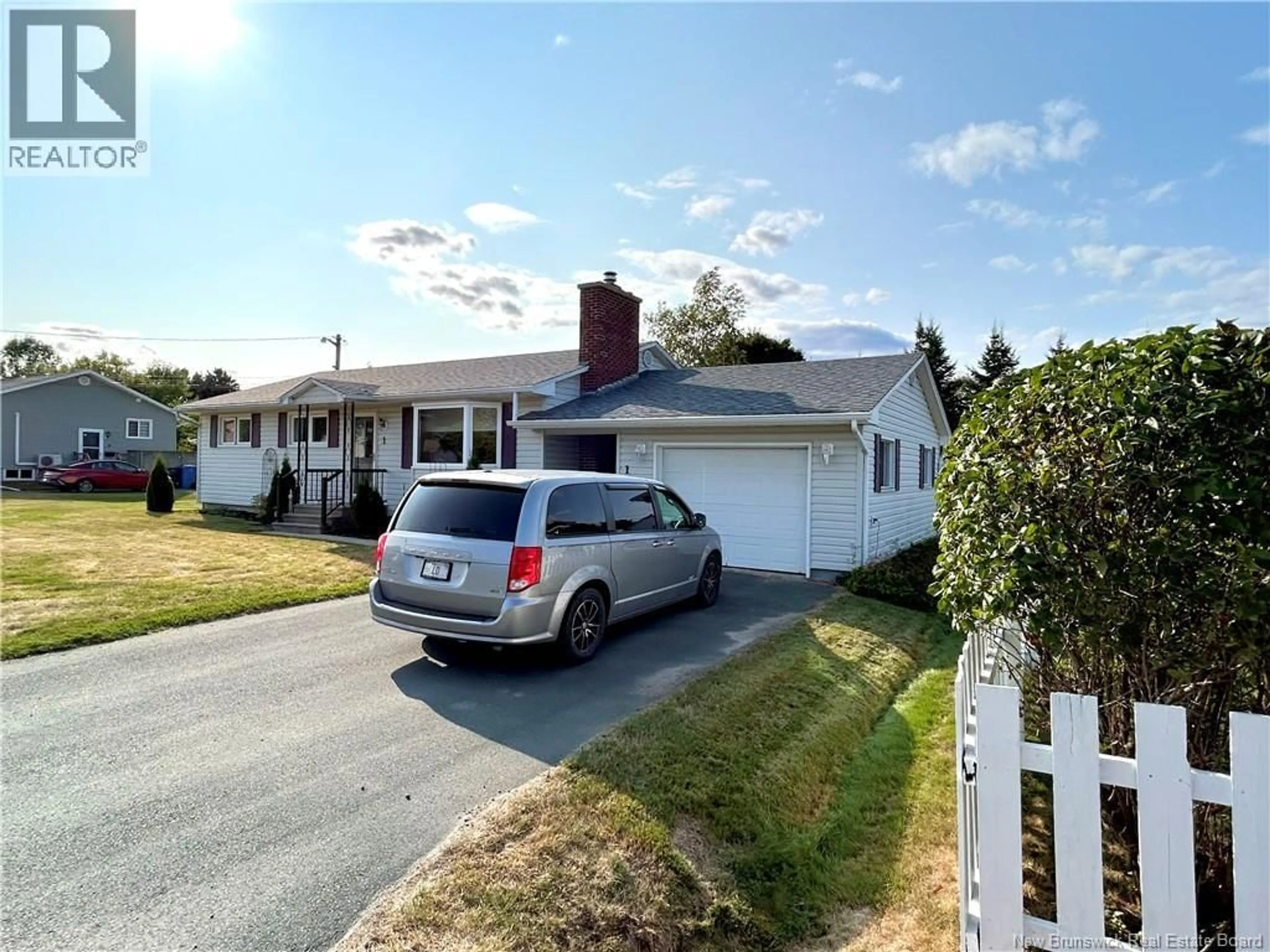 A pic from outside/outdoor area/front of a property/back of a property/a pic from drone, street for 1 VANSTONE AVENUE, Miramichi New Brunswick E1N1Y2