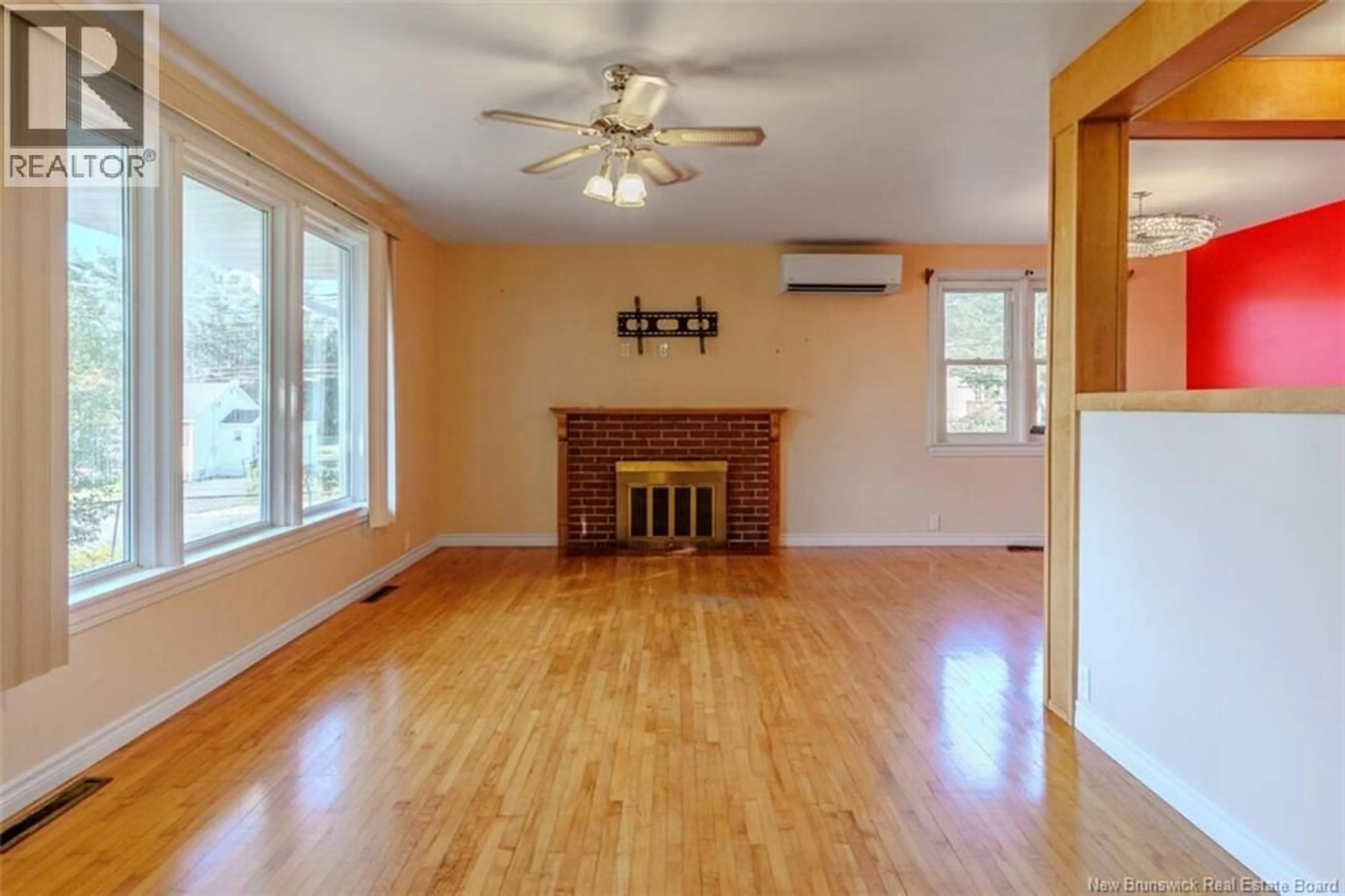 Living room with furniture, wood/laminate floor for 6 ANN STREET, Saint John New Brunswick E2J3R2