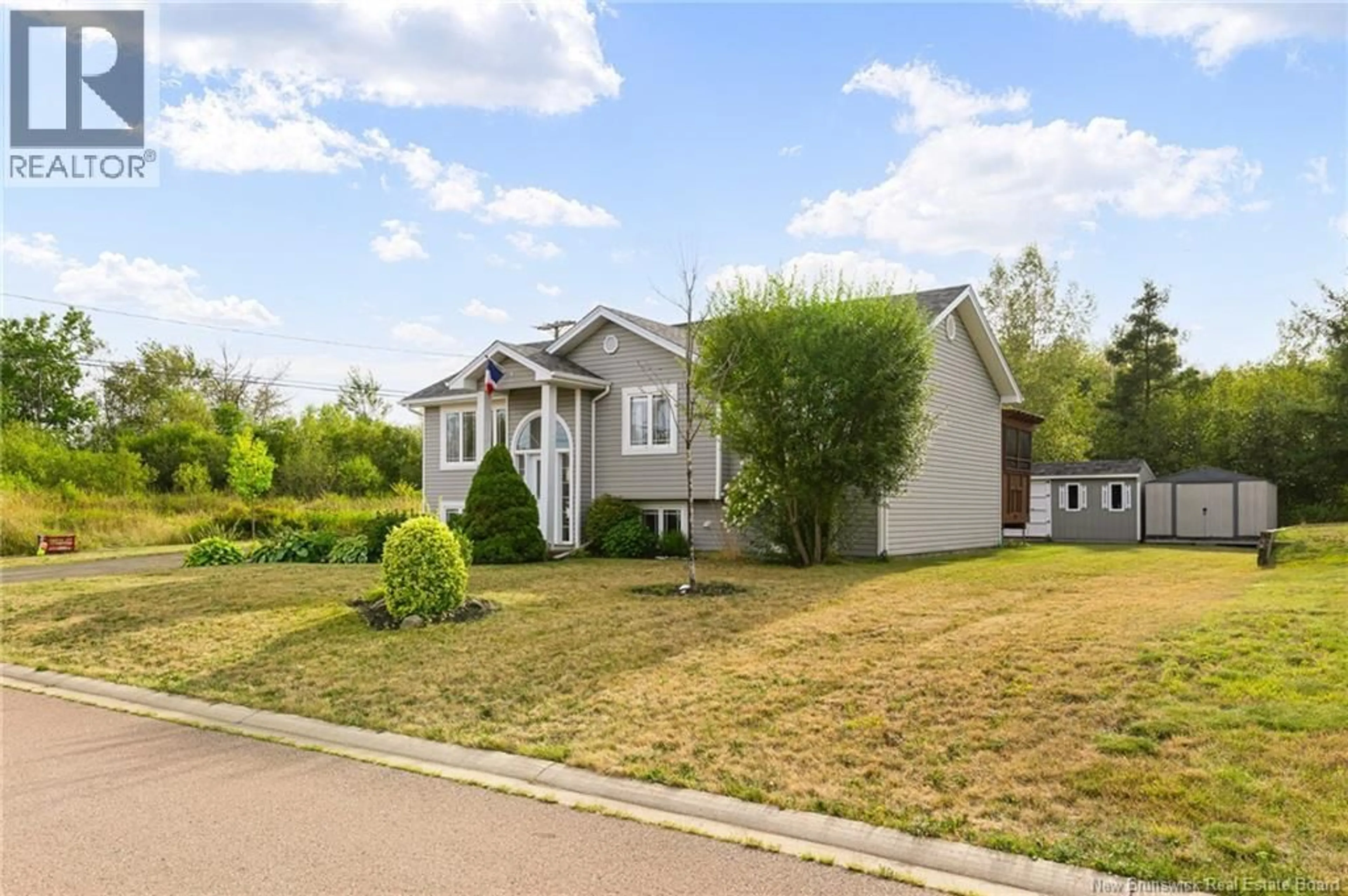 Home with vinyl exterior material, street for 10 ADOLPHE, Dieppe New Brunswick E1A8R8