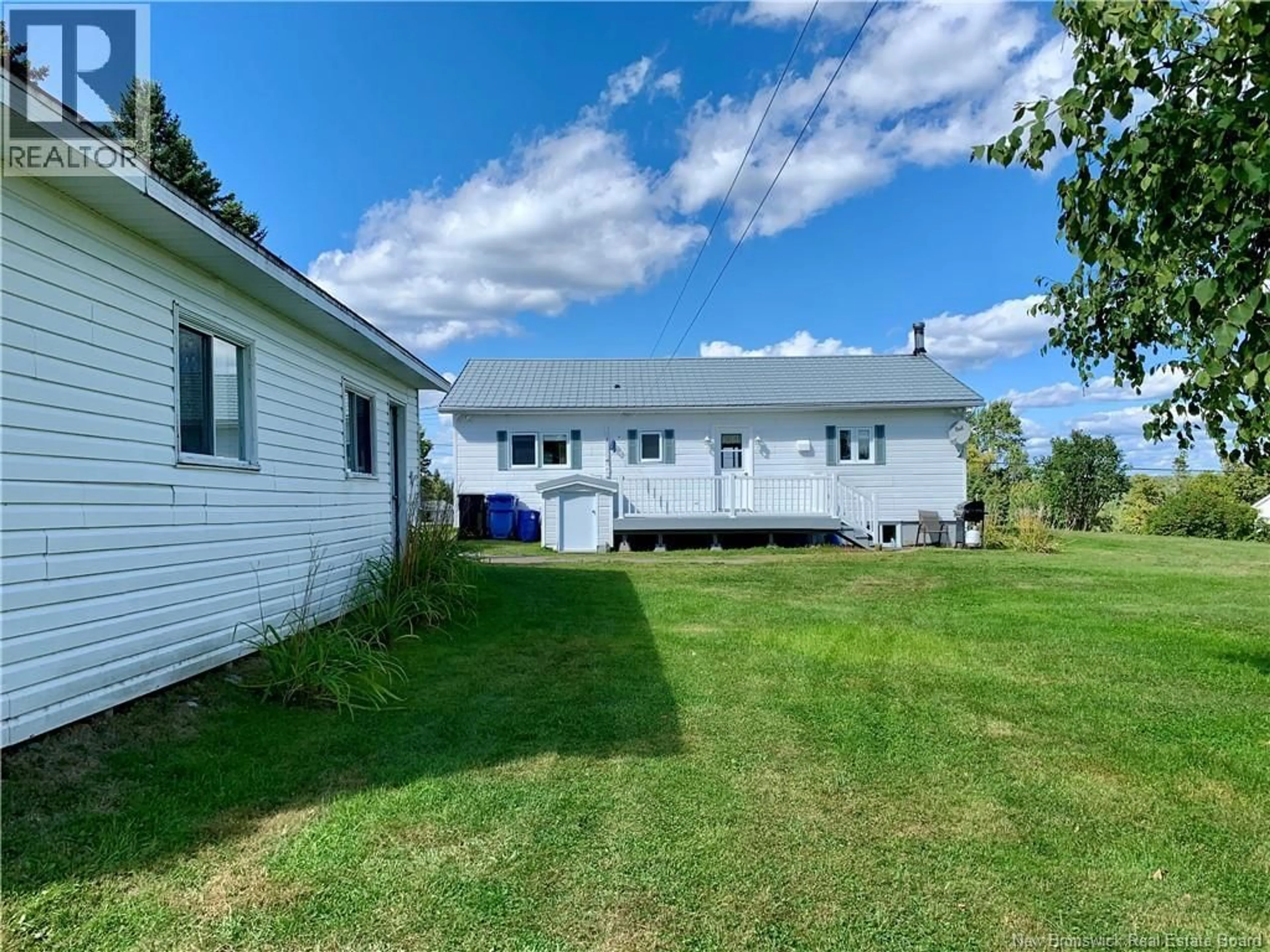 A pic from outside/outdoor area/front of a property/back of a property/a pic from drone, water/lake/river/ocean view for 21 MALENFANT, Dundee New Brunswick E8E1W8