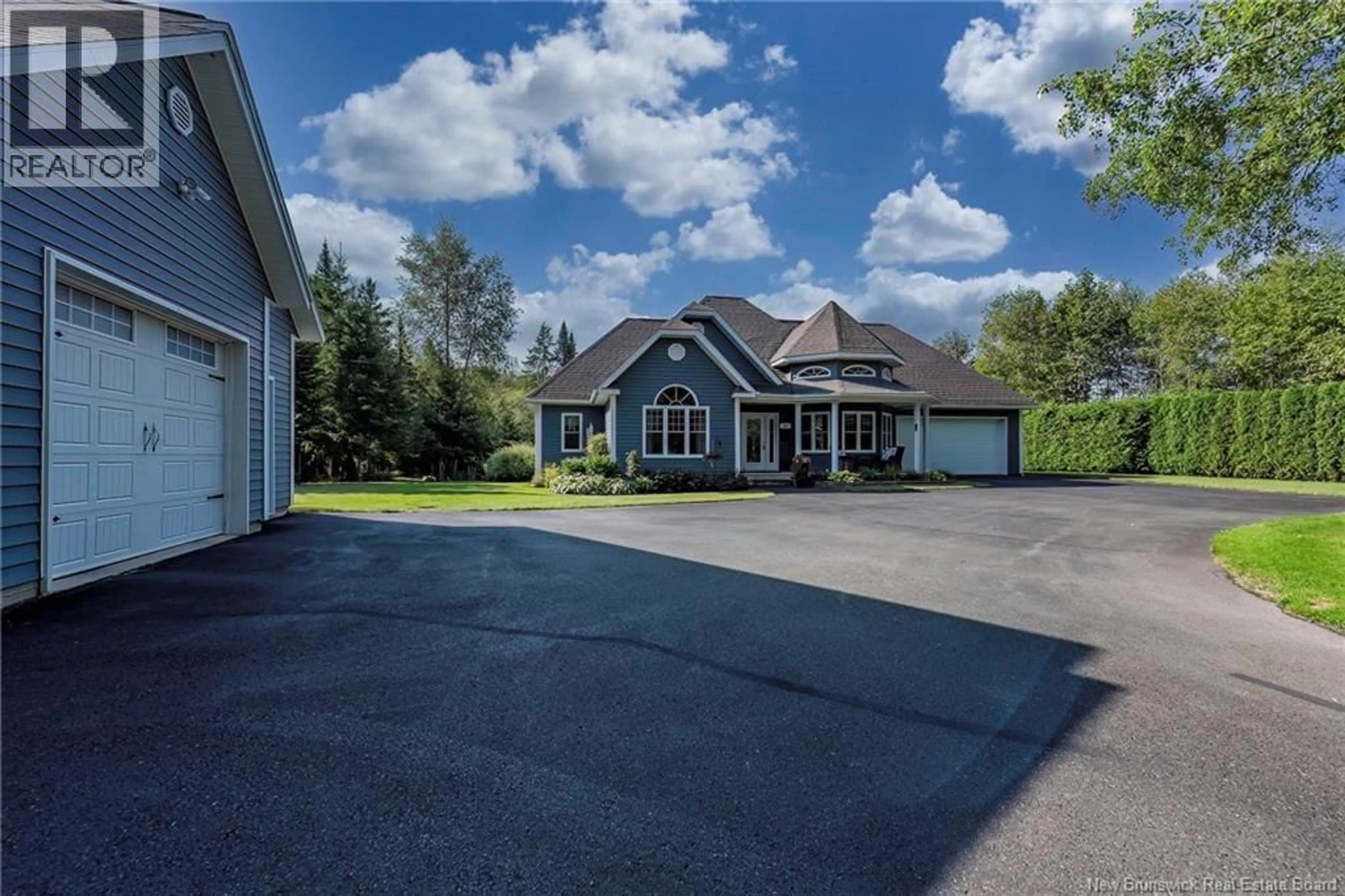 A pic from outside/outdoor area/front of a property/back of a property/a pic from drone, water/lake/river/ocean view for 63 RIVERSIDE CRESCENT, DSL de Drummond/DSL of Drummond New Brunswick E3Y3Y2