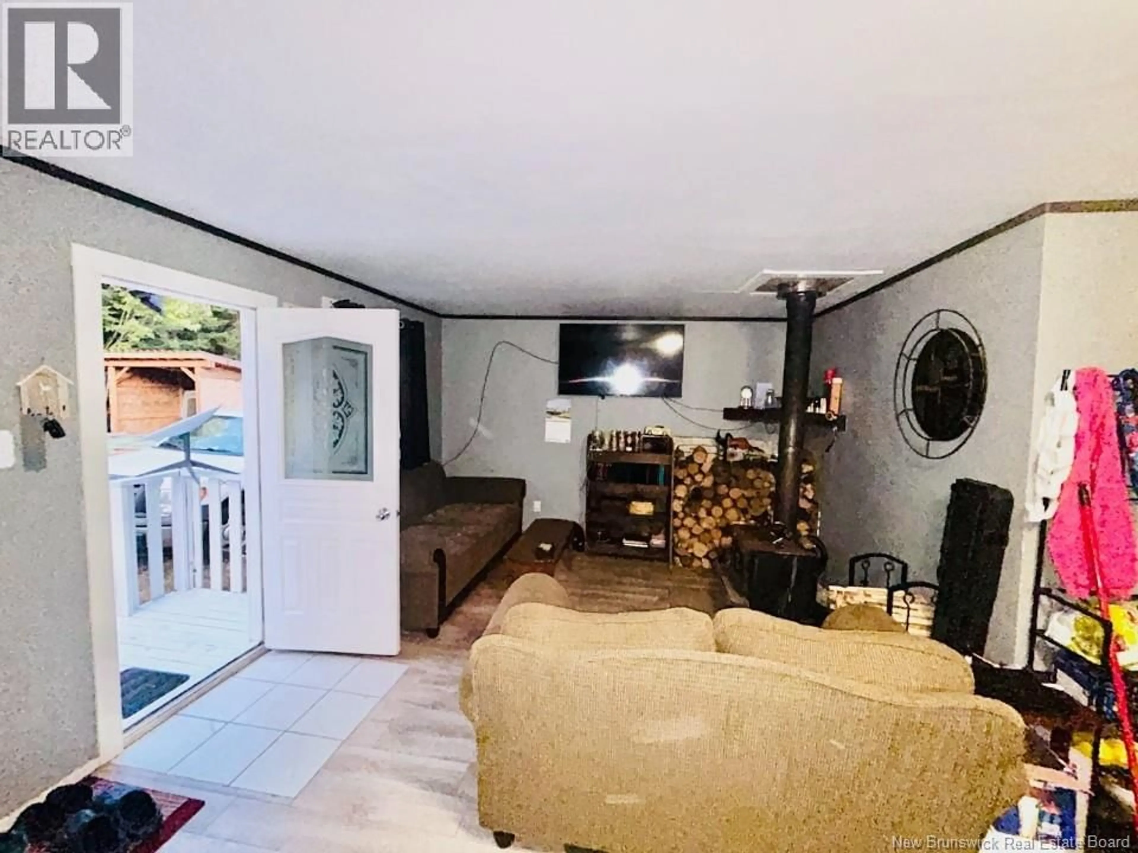 Living room with furniture, unknown for 445 POST ROAD, Iron Bound Cove New Brunswick E4A1S7