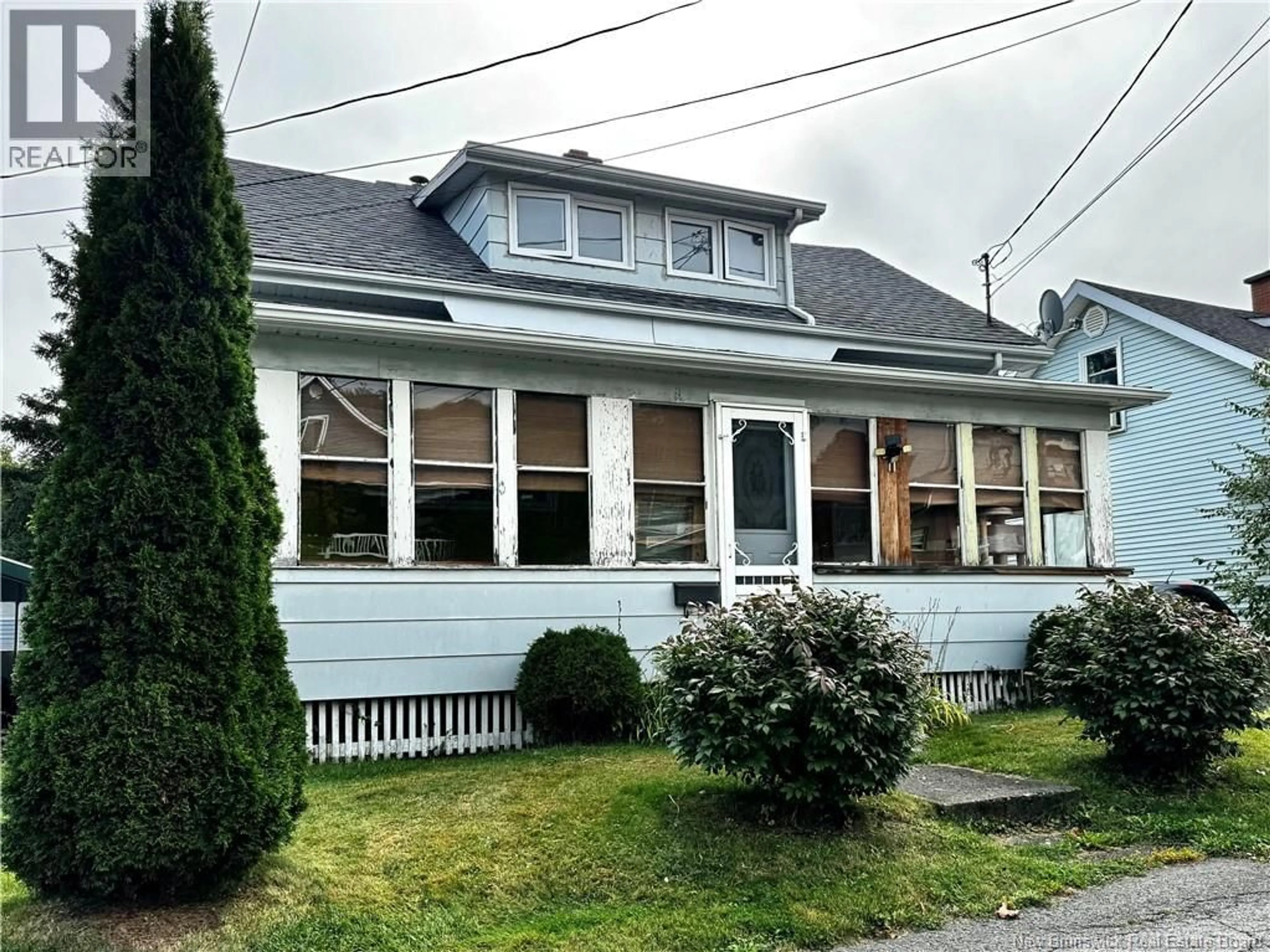 Home with vinyl exterior material, street for 71 21E AVENUE, Edmundston New Brunswick E3V2C2
