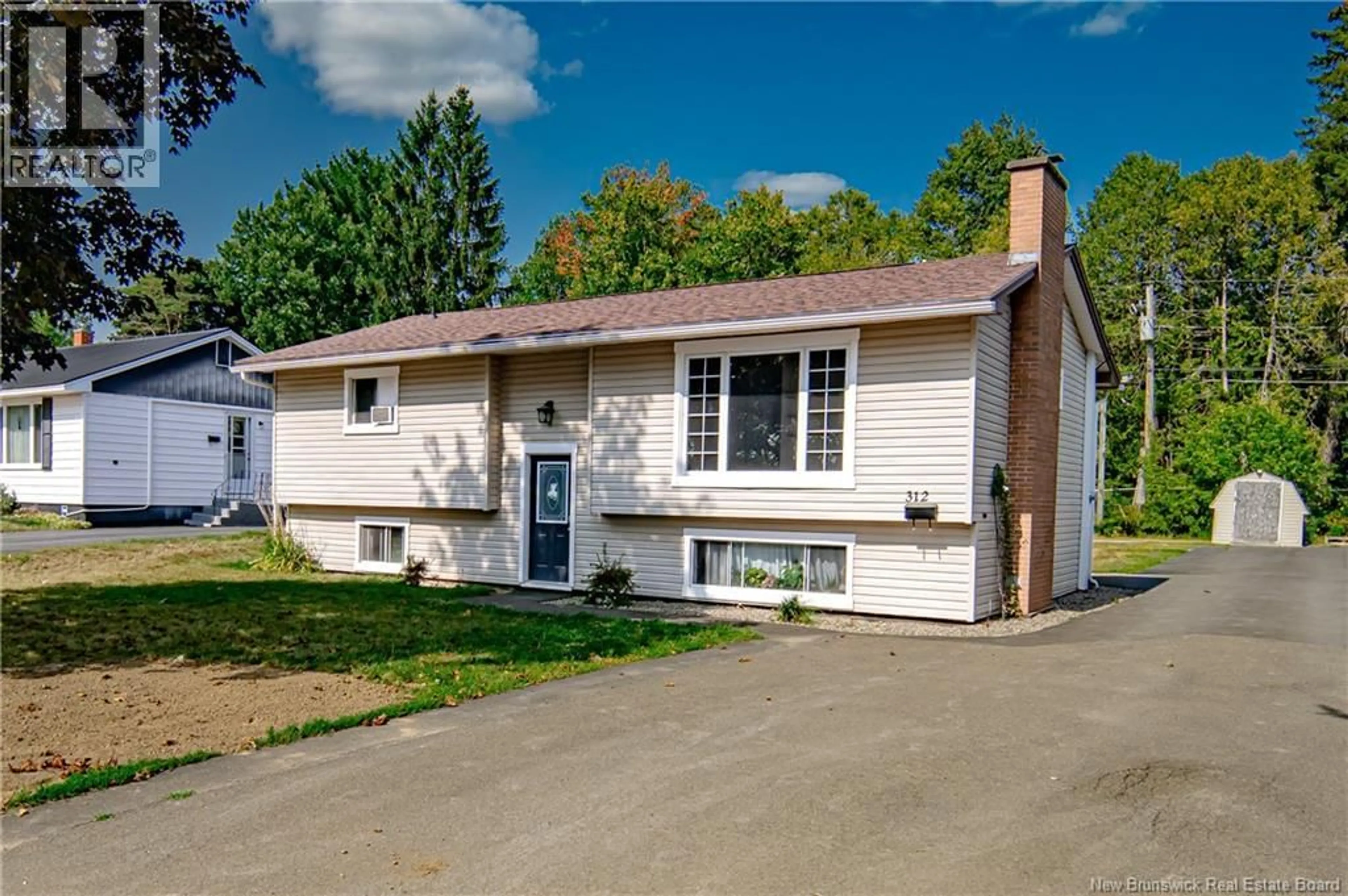 Home with vinyl exterior material, street for 312 PUGH STREET, Fredericton New Brunswick E3A1Y6