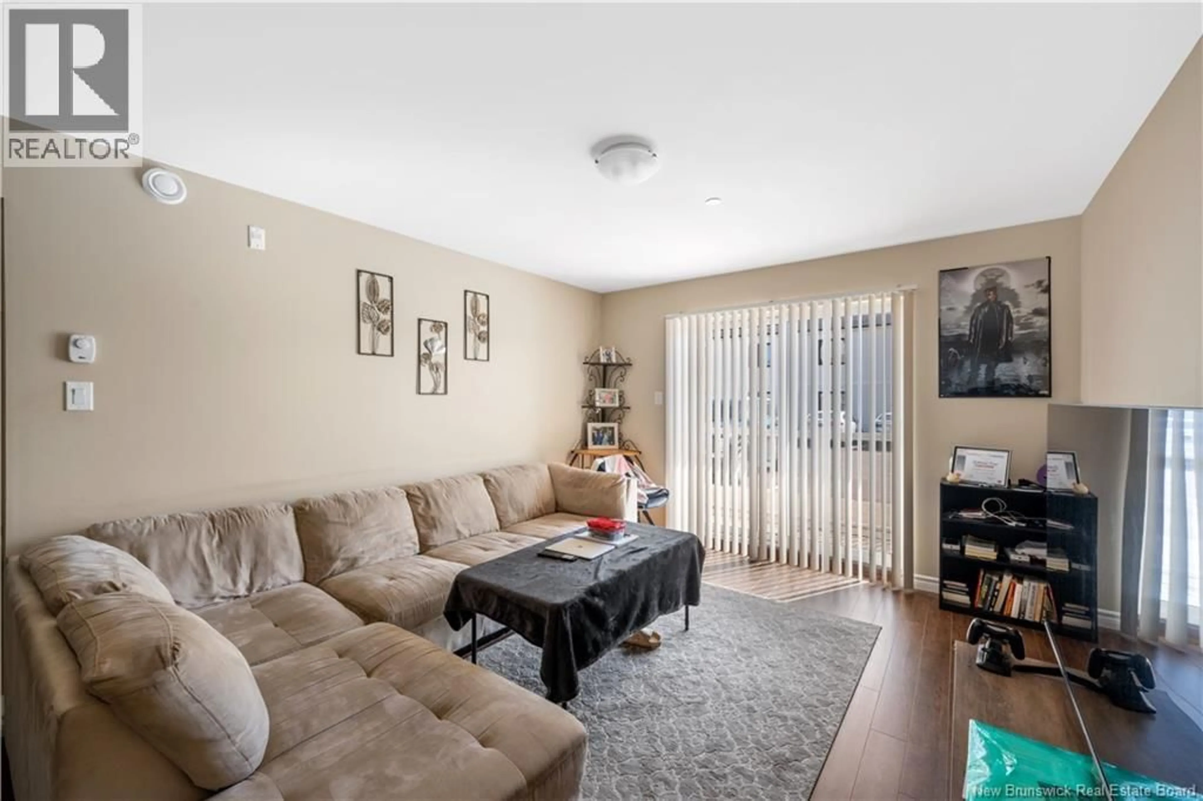 Living room with furniture, unknown for 106 - 33 SIFROI STREET, Dieppe New Brunswick E1A5T1