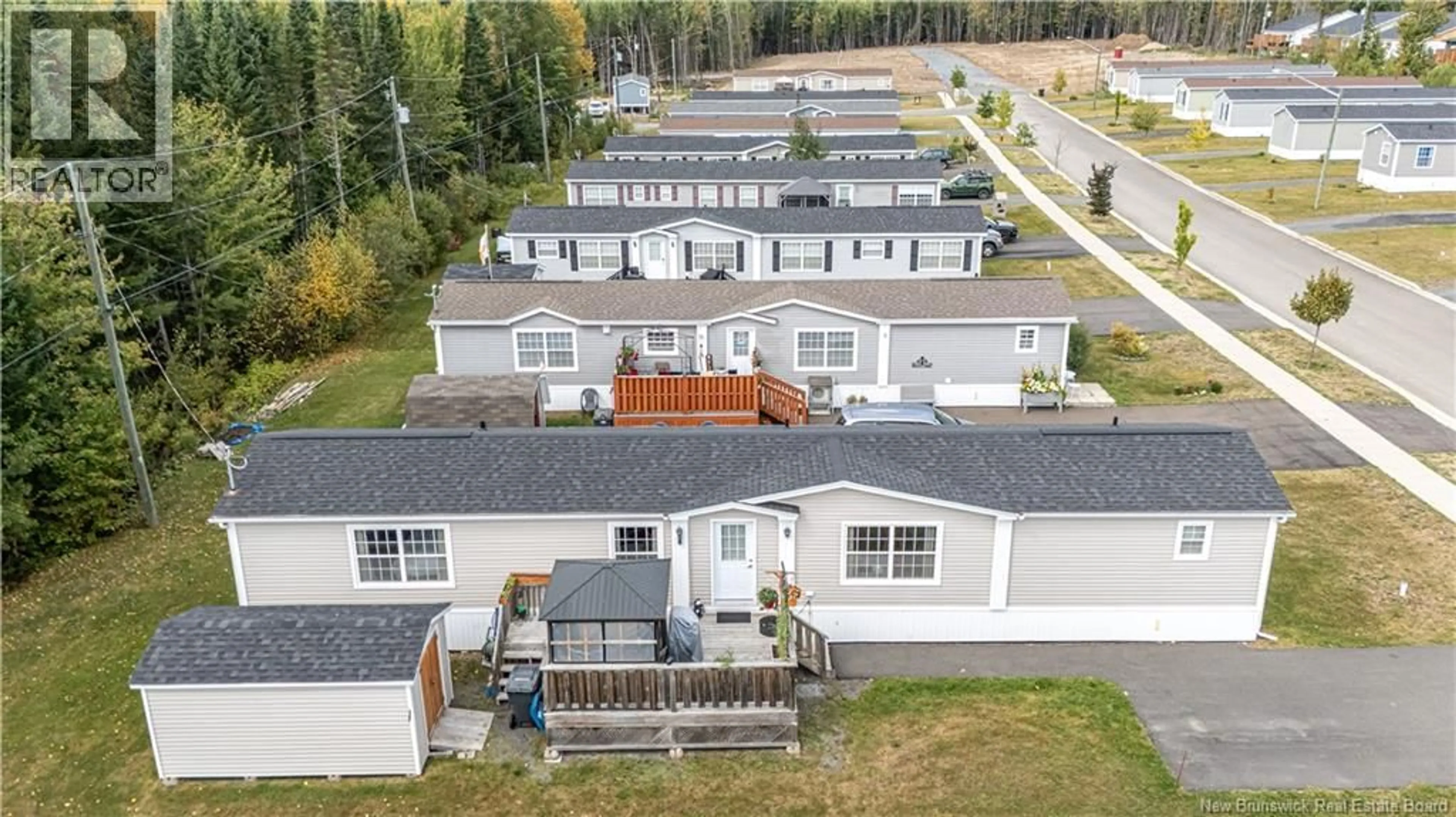 A pic from outside/outdoor area/front of a property/back of a property/a pic from drone, unknown for 21 SHANNON STREET, Fredericton New Brunswick E3G4C8