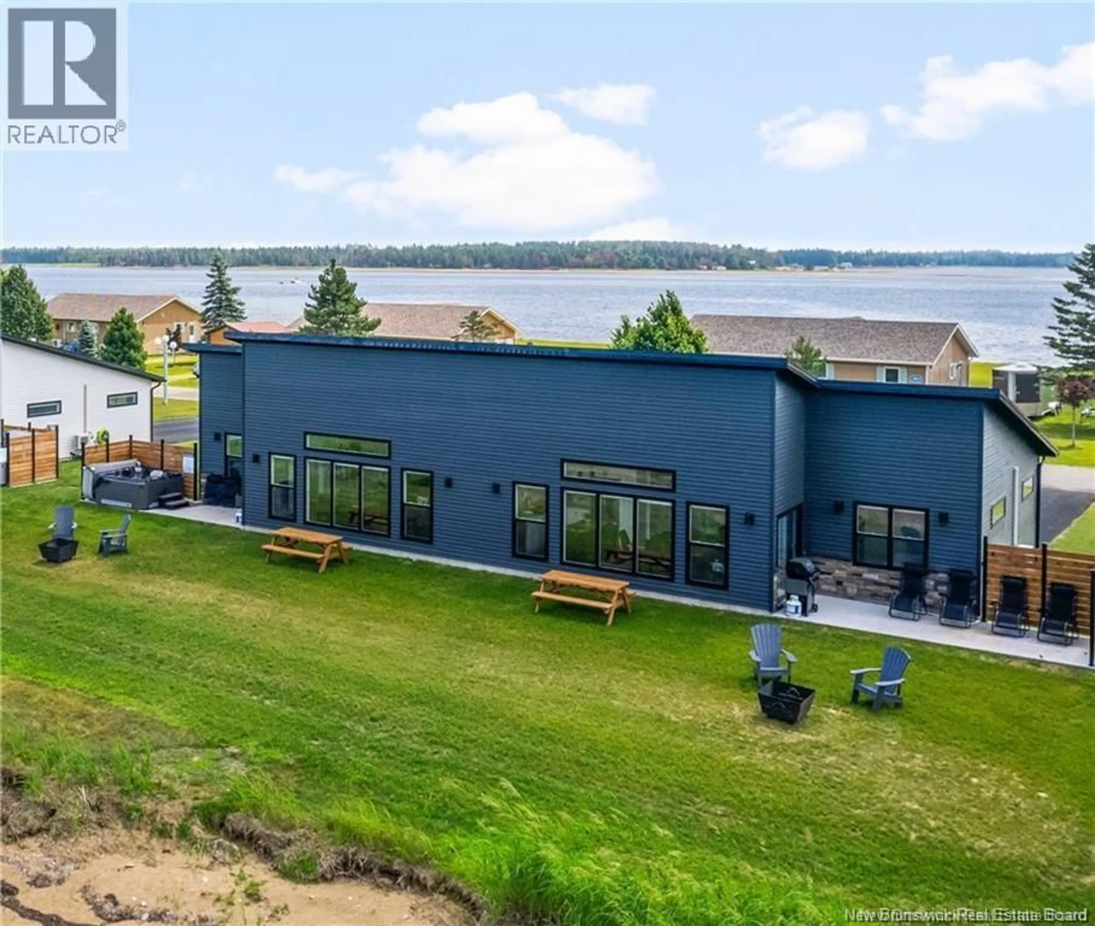A pic from outside/outdoor area/front of a property/back of a property/a pic from drone, water/lake/river/ocean view for 89 YORK, Richibucto New Brunswick E4W4K2