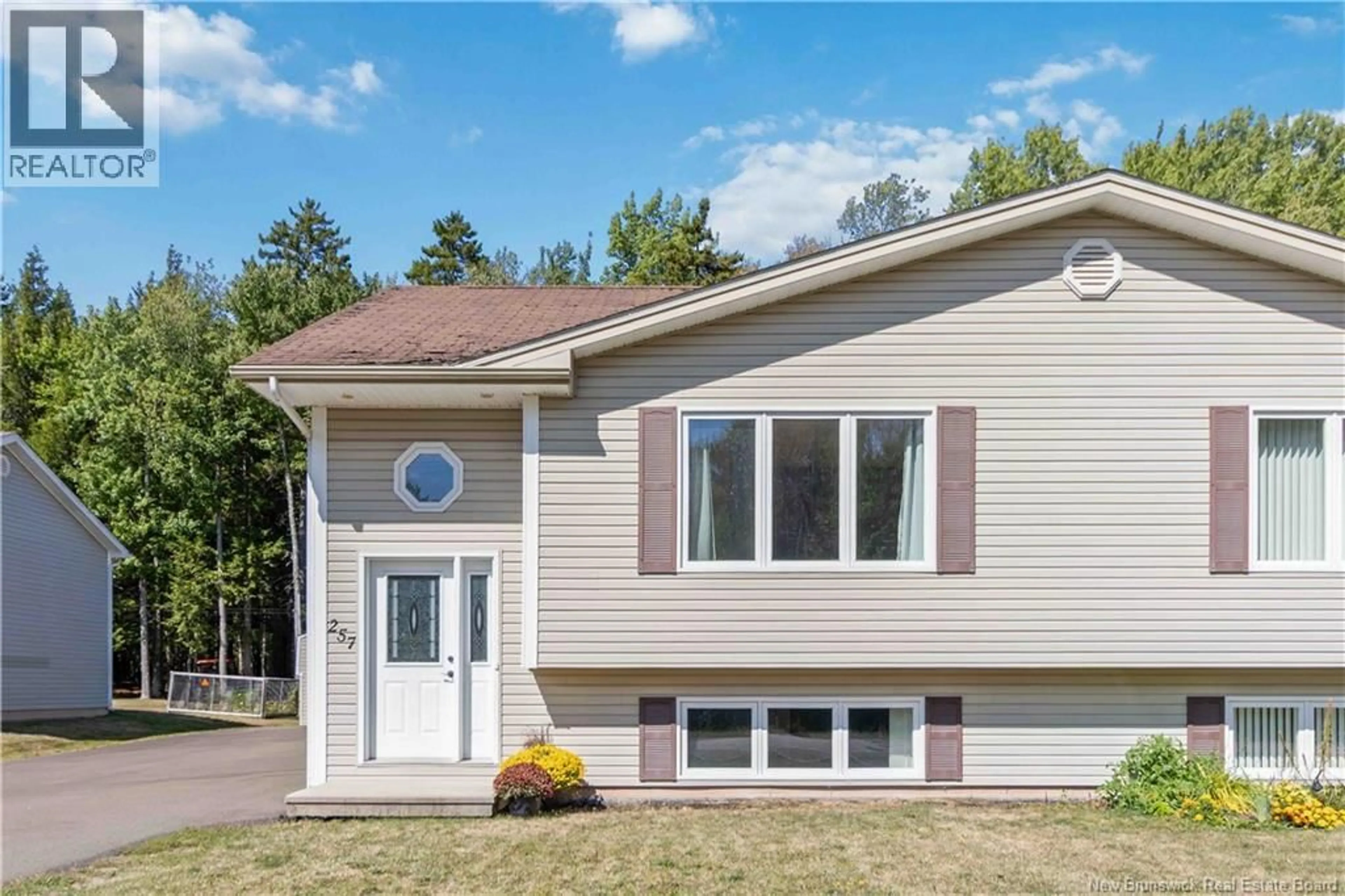 Home with vinyl exterior material, street for 257 CHARLES LUTES ROAD, Moncton New Brunswick E1G2R8