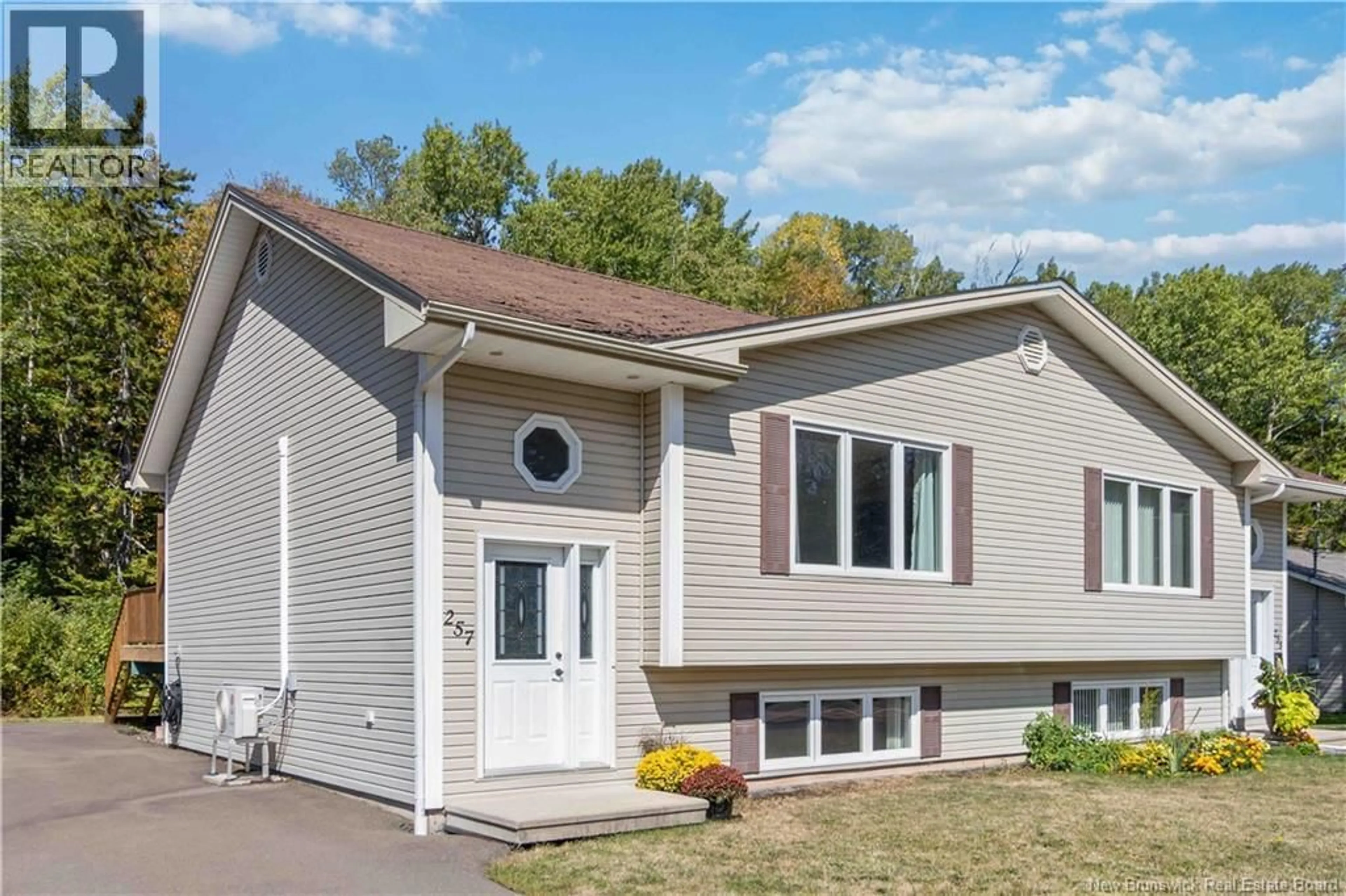 Home with vinyl exterior material, street for 257 CHARLES LUTES ROAD, Moncton New Brunswick E1G2R8