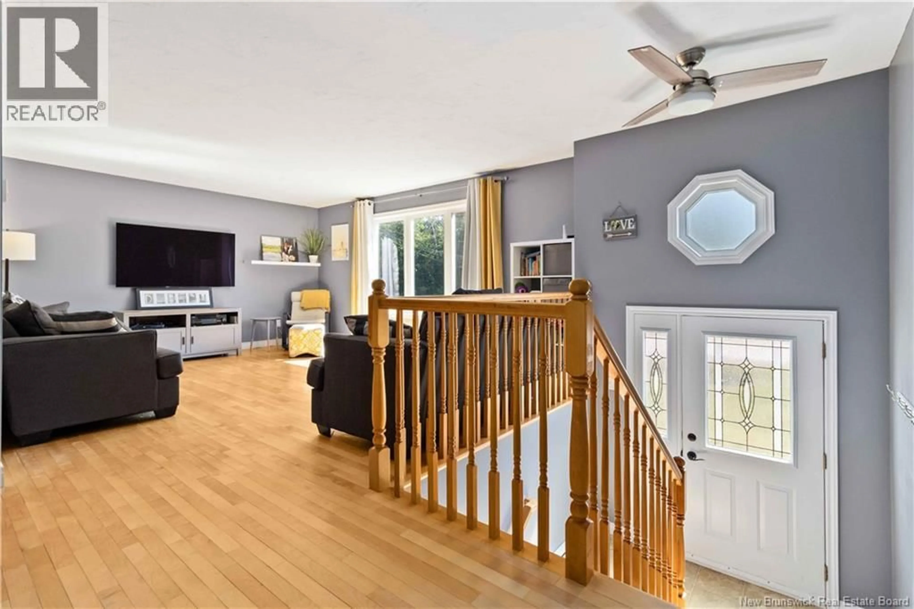 Living room with furniture, wood/laminate floor for 257 CHARLES LUTES ROAD, Moncton New Brunswick E1G2R8