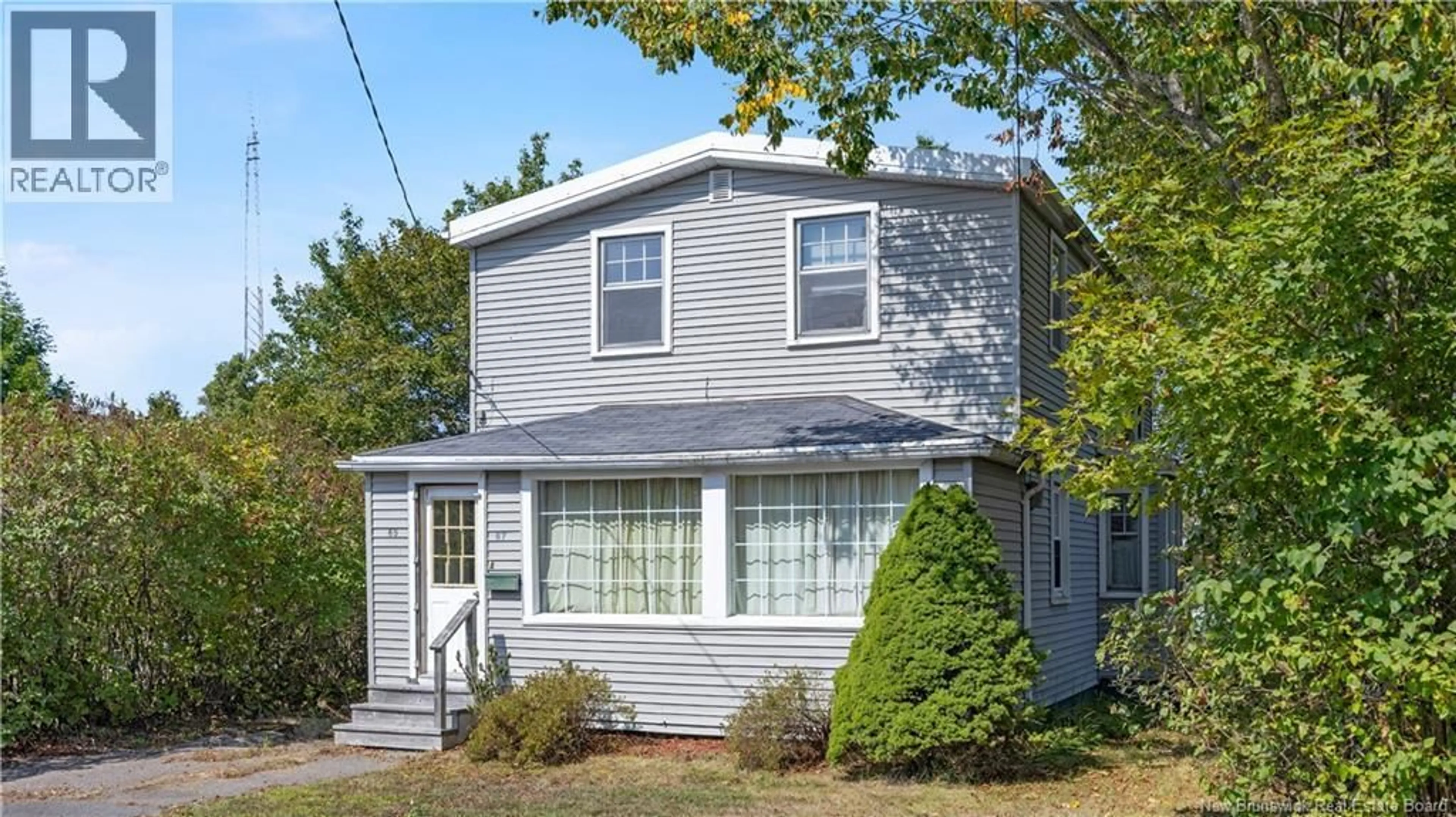 Home with vinyl exterior material, street for 65-67 THORNBROUGH STREET, Saint John New Brunswick E2K3P5