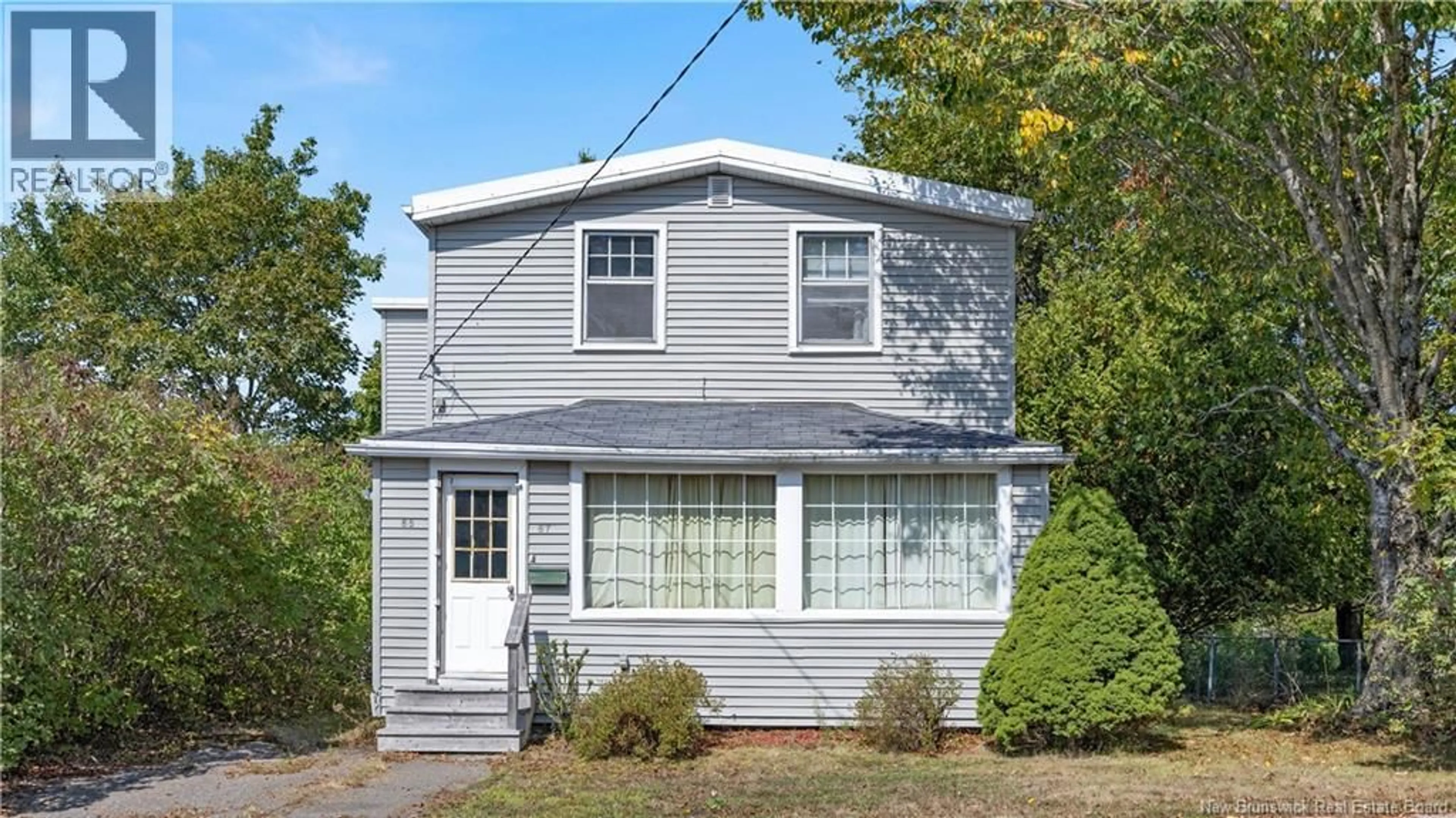 Home with vinyl exterior material, street for 65-67 THORNBROUGH STREET, Saint John New Brunswick E2K3P5
