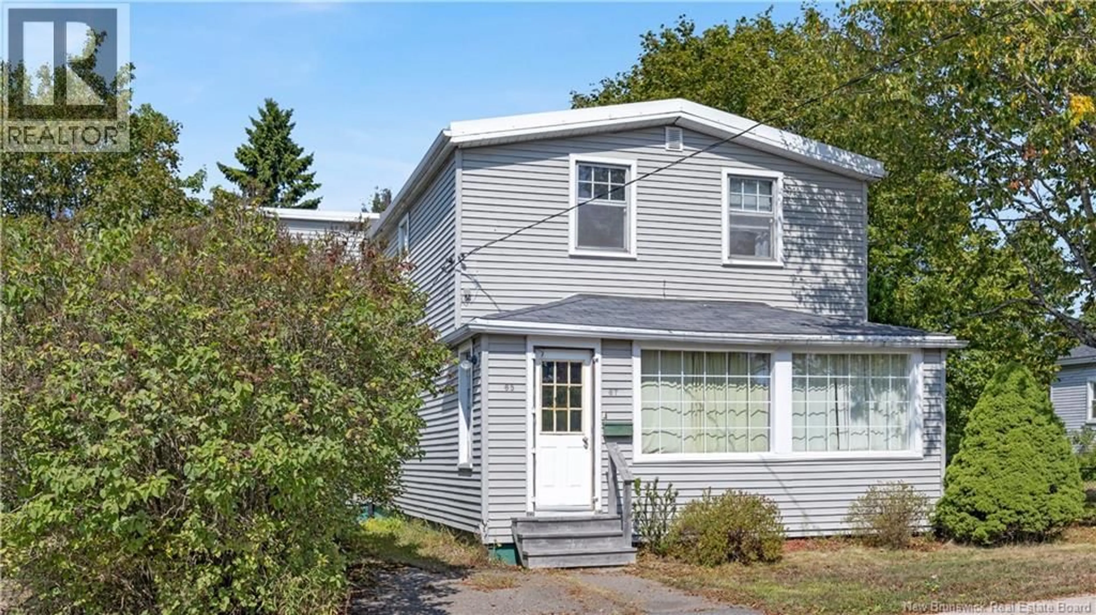 Home with vinyl exterior material, street for 65-67 THORNBROUGH STREET, Saint John New Brunswick E2K3P5