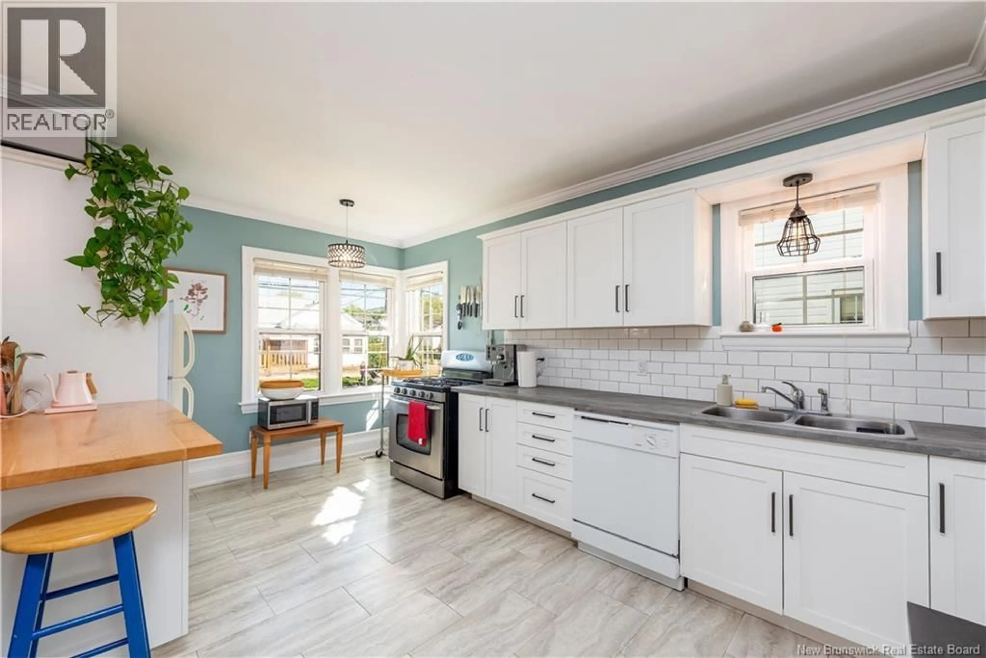 Open concept kitchen, ceramic/tile floor for 48 SHERRARD AVENUE, Moncton New Brunswick E1C3J6