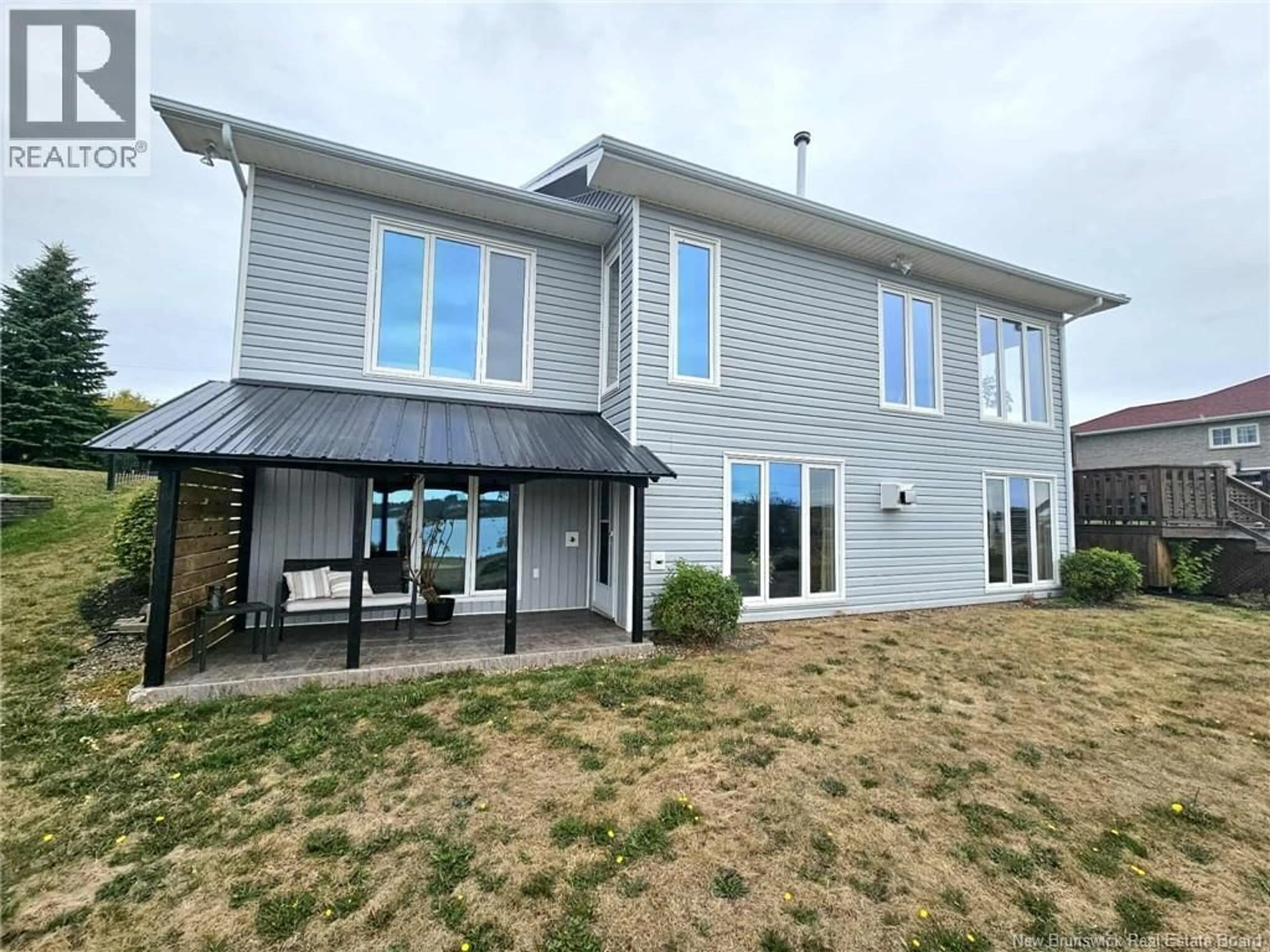 Home with vinyl exterior material, building for 1295 RIVERSIDE, Bathurst New Brunswick E2A4X2