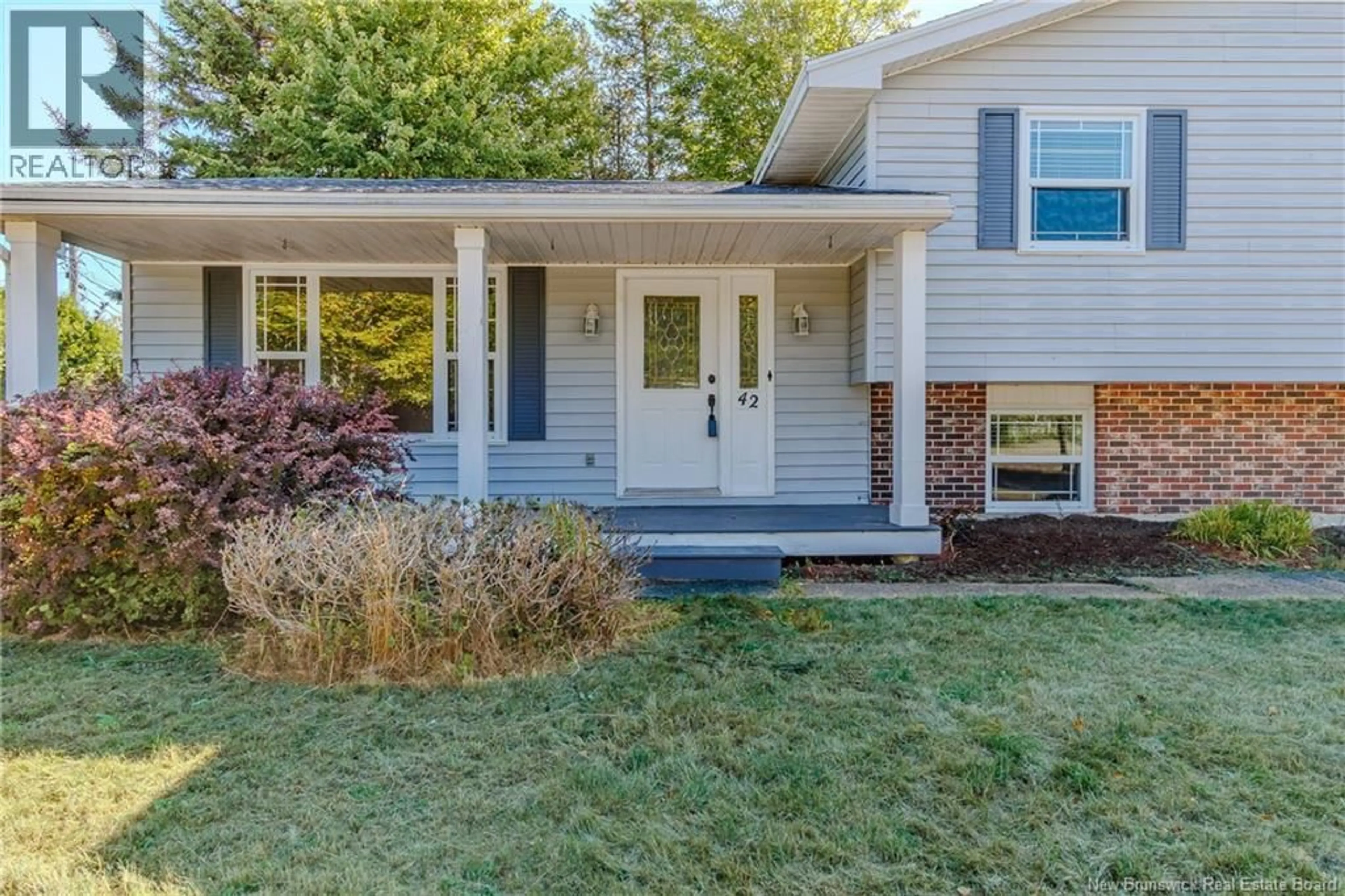 Home with vinyl exterior material, street for 42 PEAT DRIVE, Quispamsis New Brunswick E2E4R5