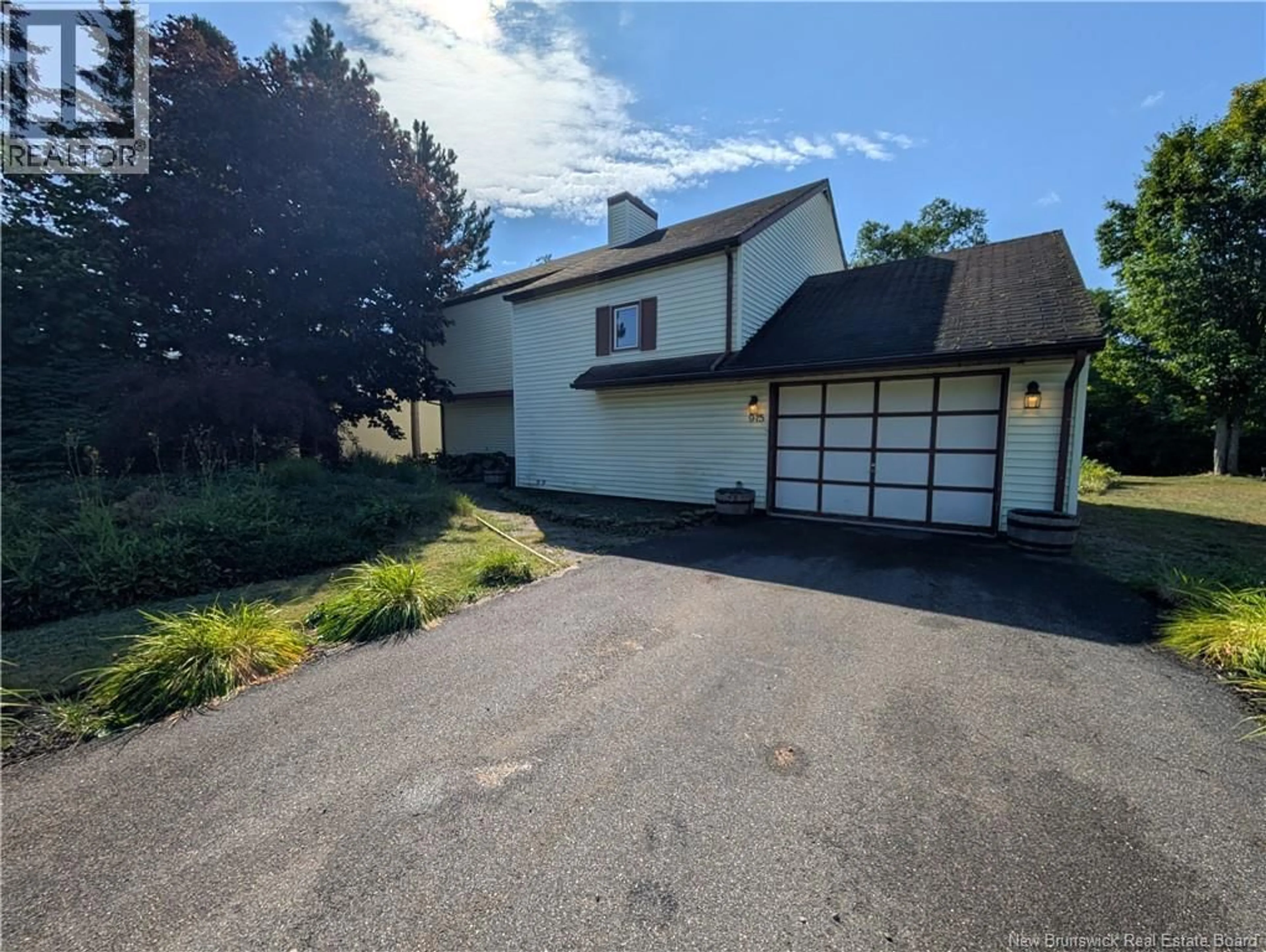 A pic from outside/outdoor area/front of a property/back of a property/a pic from drone, street for 975 TAMARACK DRIVE, Bathurst New Brunswick E2A4G1