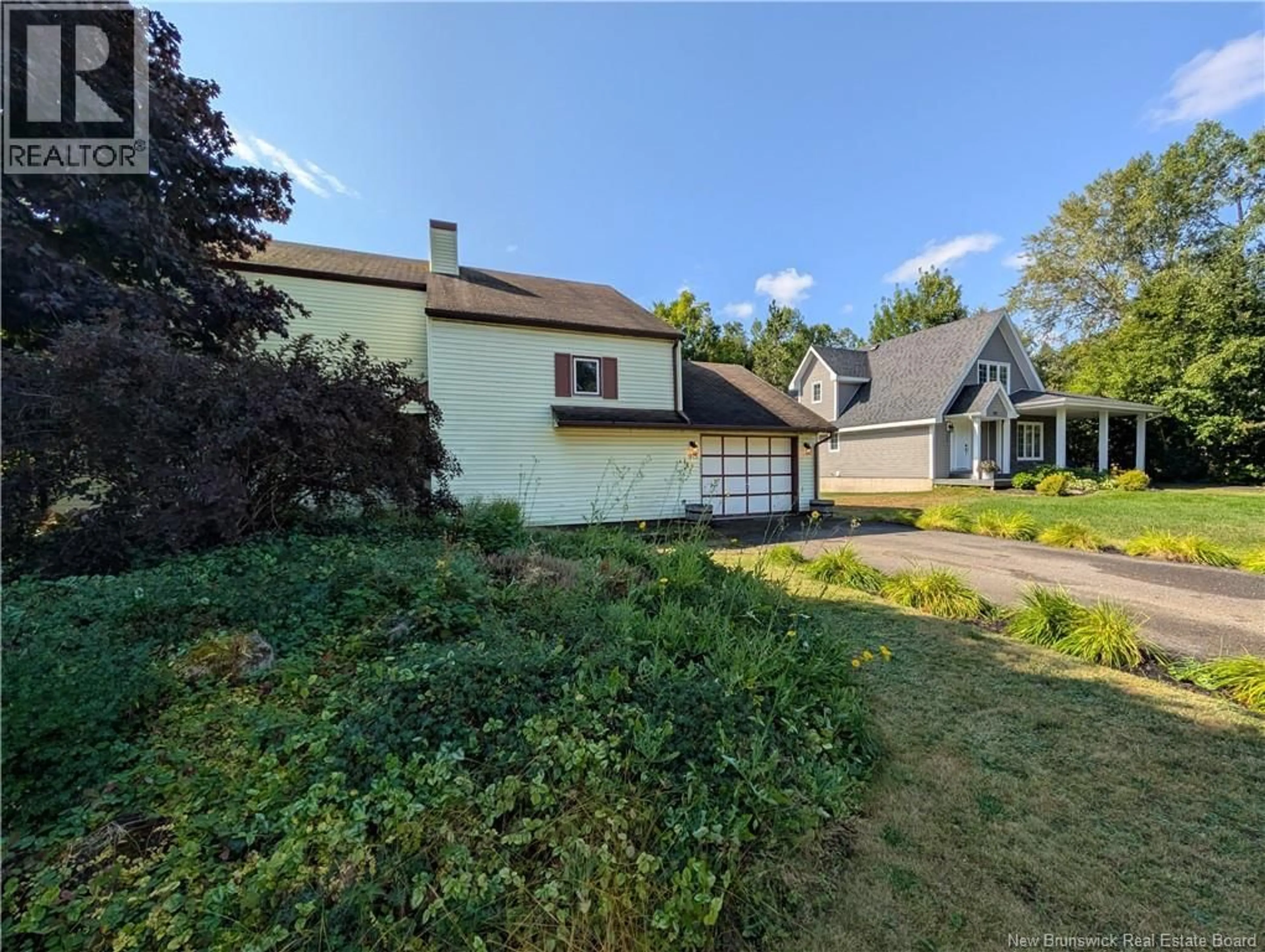 A pic from outside/outdoor area/front of a property/back of a property/a pic from drone, street for 975 TAMARACK DRIVE, Bathurst New Brunswick E2A4G1