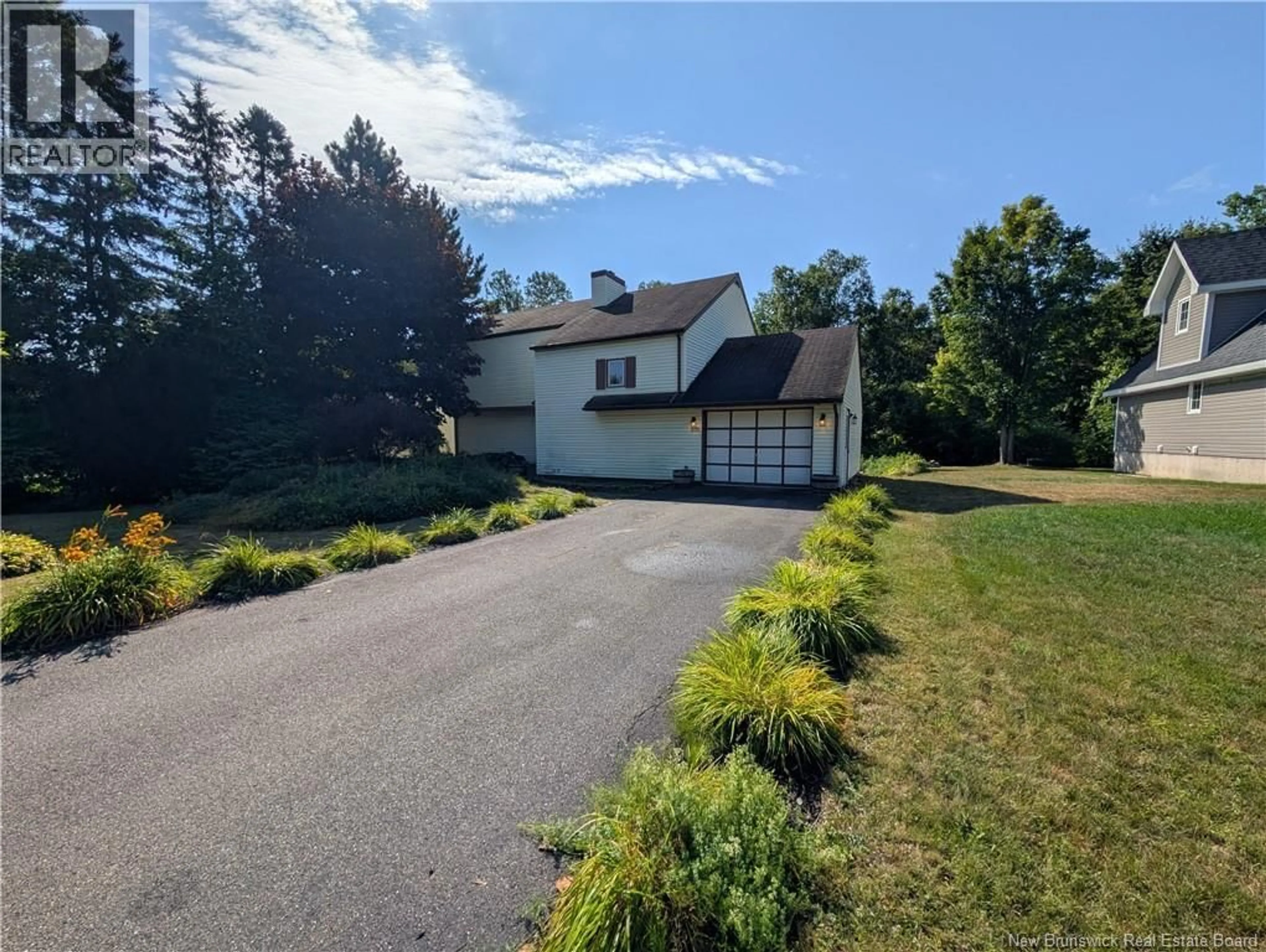 A pic from outside/outdoor area/front of a property/back of a property/a pic from drone, unknown for 975 TAMARACK DRIVE, Bathurst New Brunswick E2A4G1