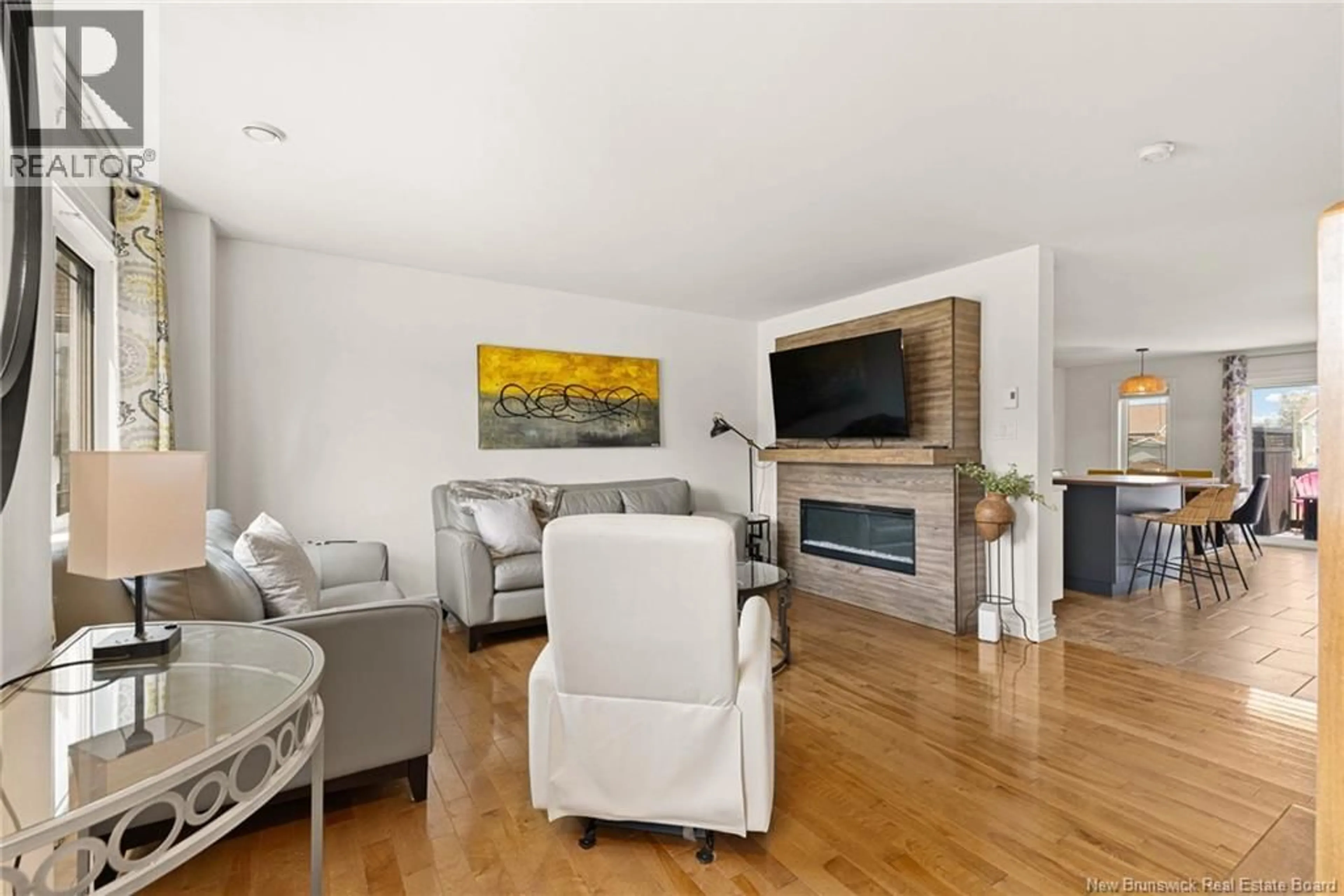 Living room with furniture, wood/laminate floor for 15 MYRIAM CRESCENT, Moncton New Brunswick E1A0V4
