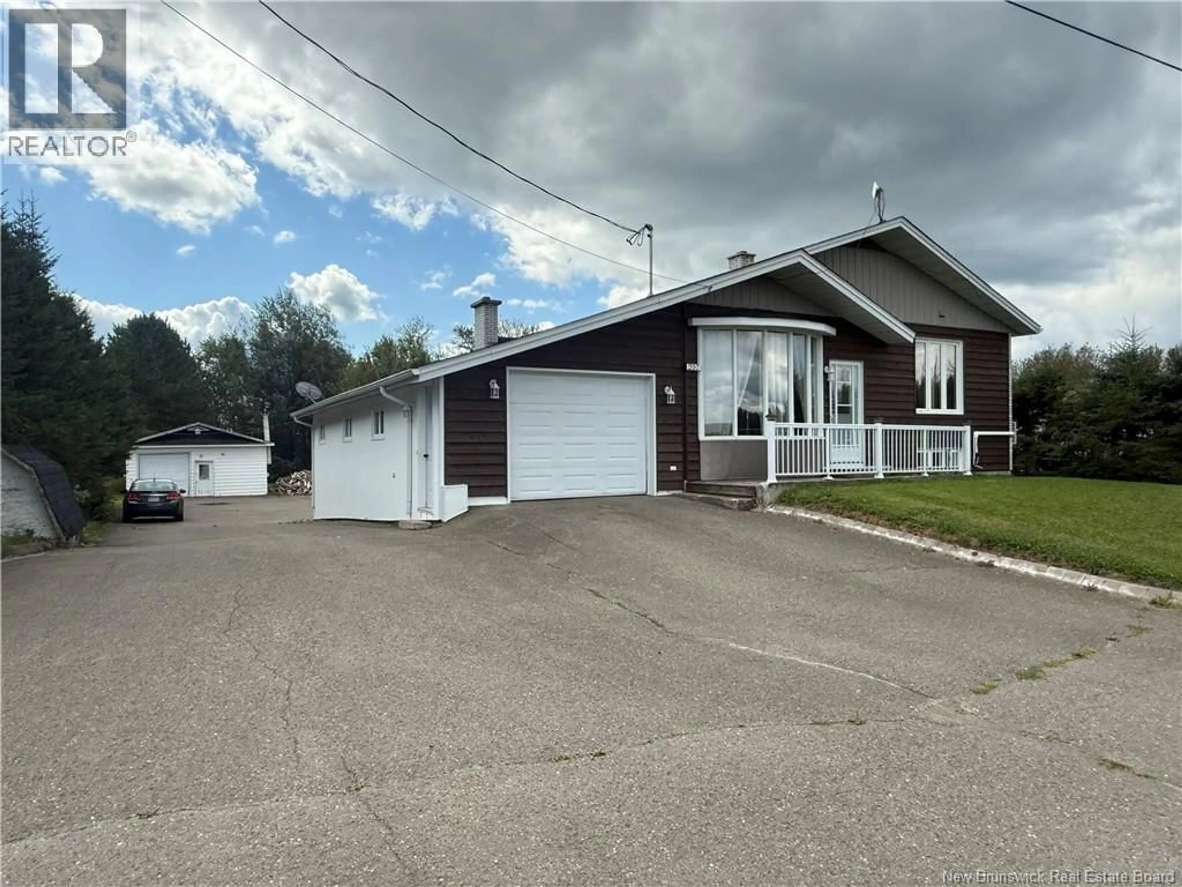 Home with vinyl exterior material, street for 207 CH 1IER RANG ROAD, DSL de Drummond/DSL of Drummond New Brunswick E3Y2S6