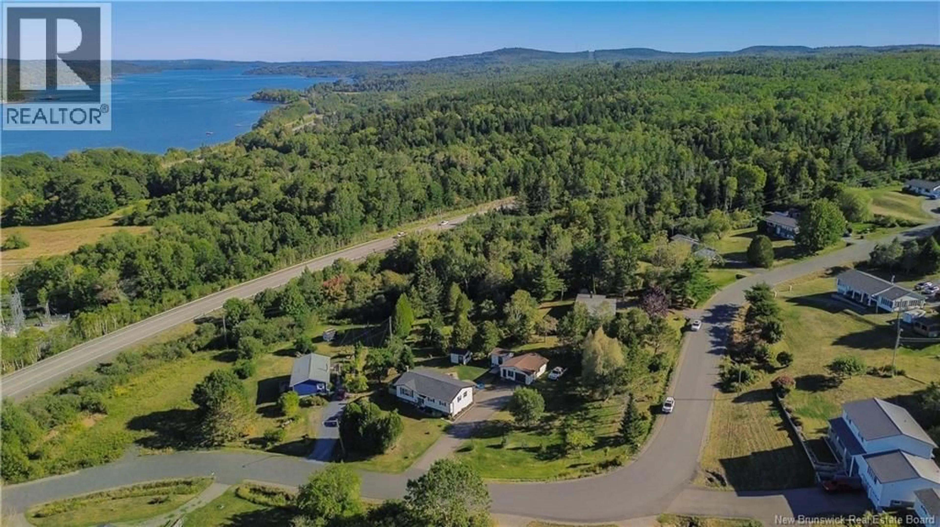 A pic from outside/outdoor area/front of a property/back of a property/a pic from drone, water/lake/river/ocean view for 5 LACROIX DRIVE, Grand Bay-Westfield New Brunswick E5K3H7