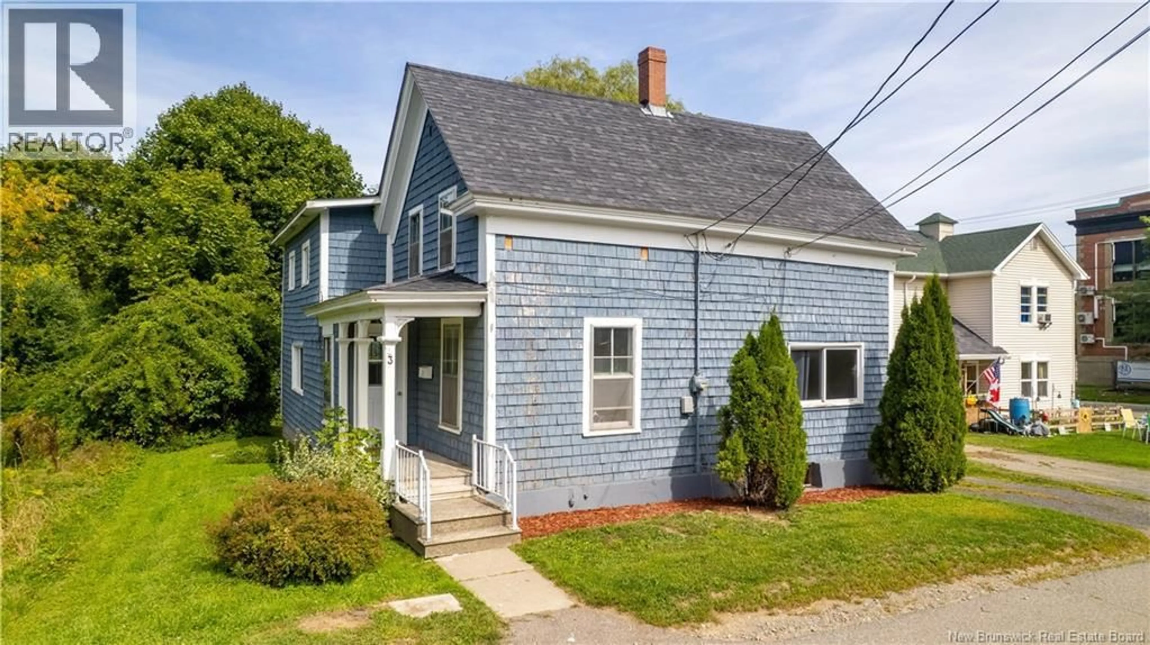 Home with vinyl exterior material, street for 3 CARLETON STREET, St. Stephen New Brunswick E3L2N6