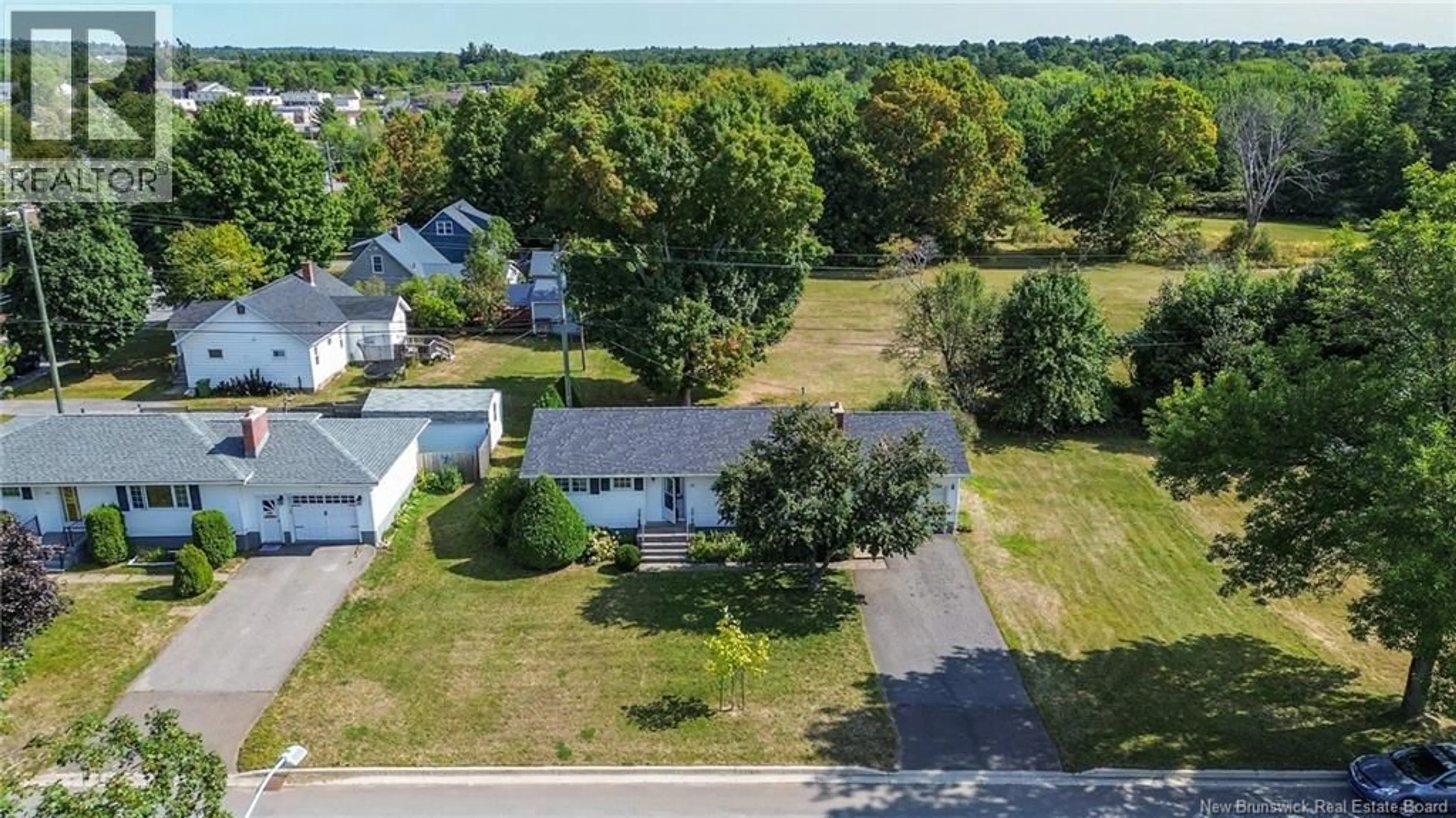 A pic from outside/outdoor area/front of a property/back of a property/a pic from drone, street for 200 BURPEE STREET, Fredericton New Brunswick E3A1M7