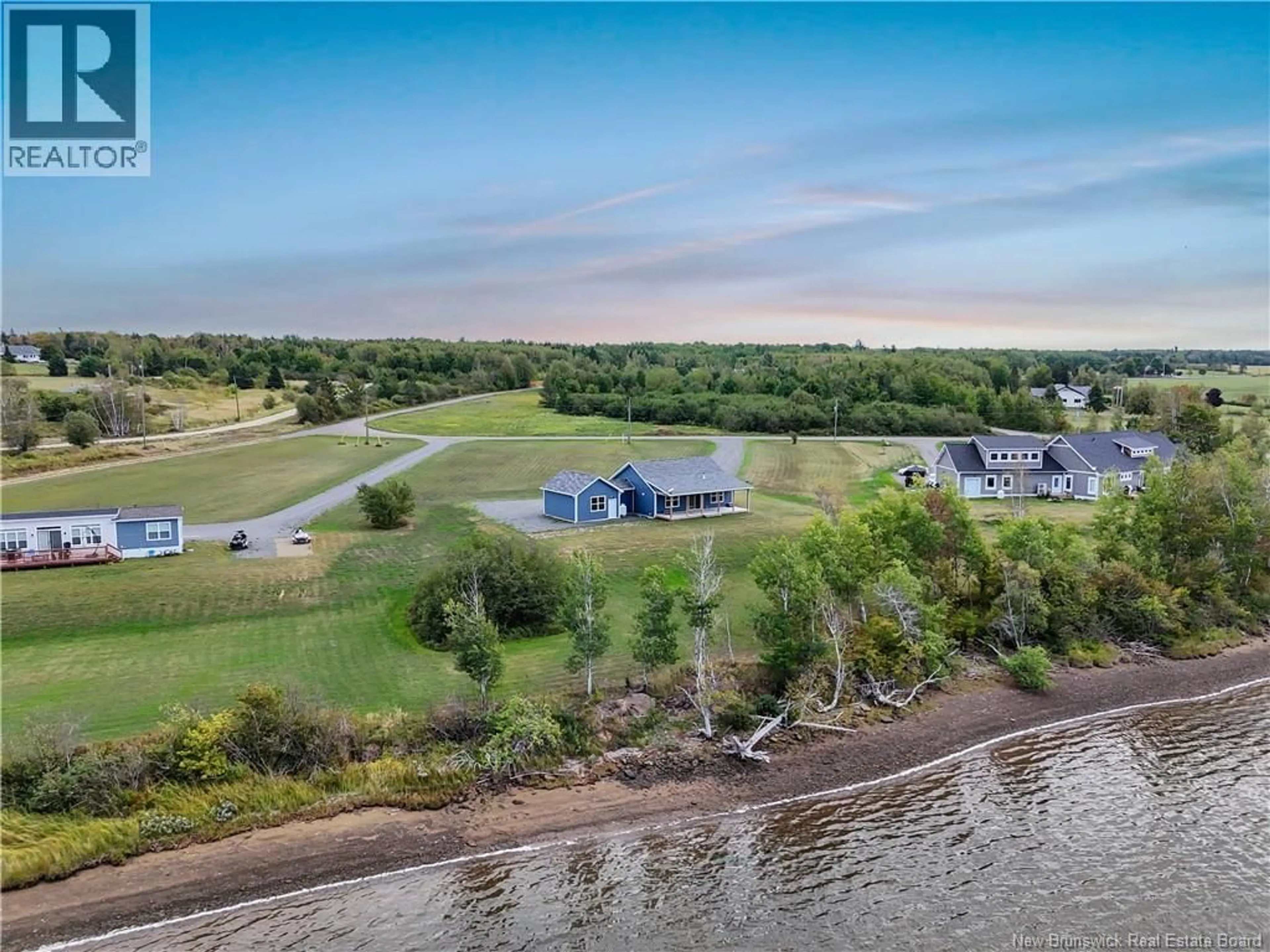 A pic from outside/outdoor area/front of a property/back of a property/a pic from drone, water/lake/river/ocean view for 34 MCKINNON, Main River New Brunswick E4T1T8