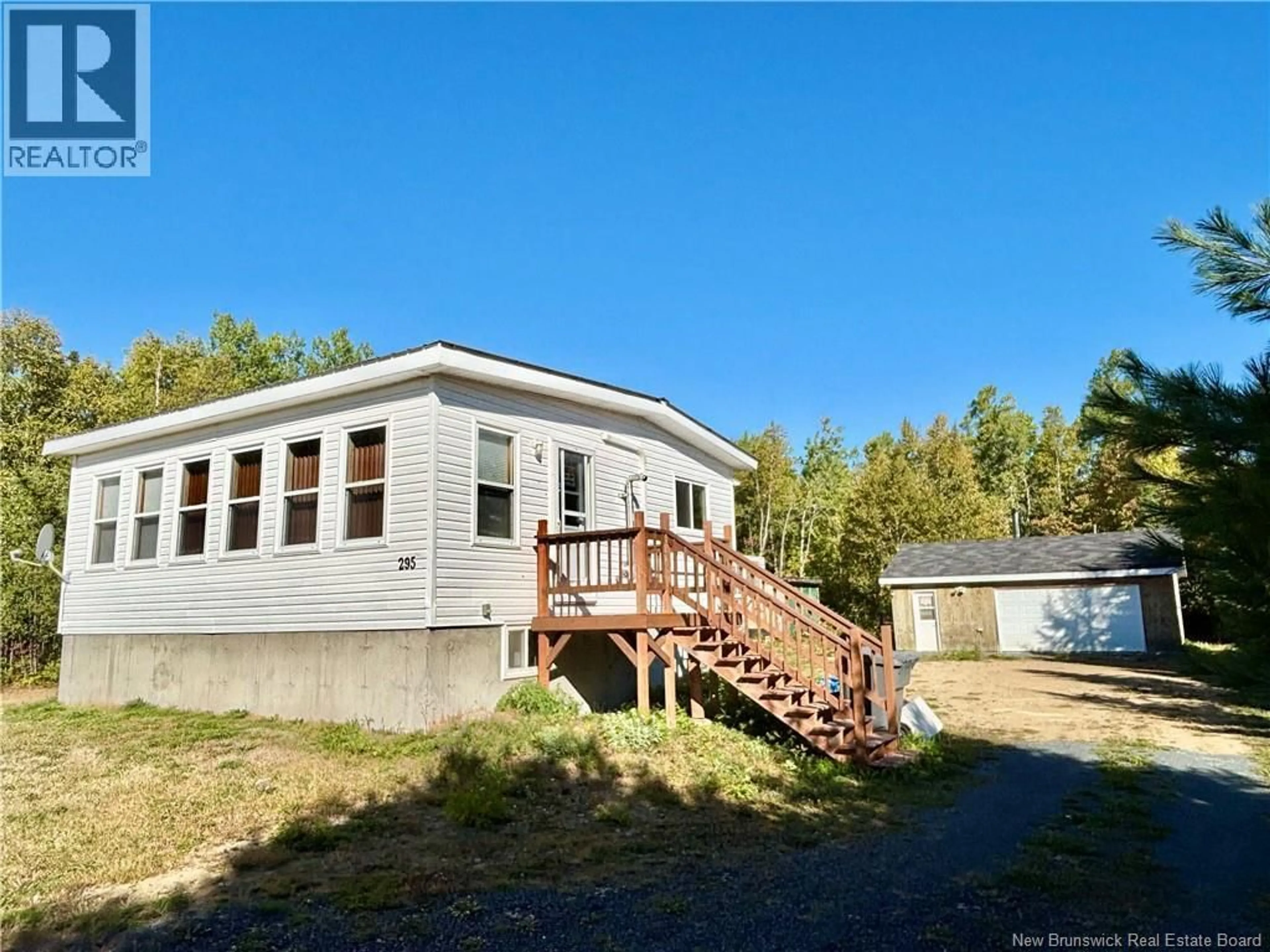 A pic from outside/outdoor area/front of a property/back of a property/a pic from drone, unknown for 295 RTE 450, Lavillette New Brunswick E9G2R1