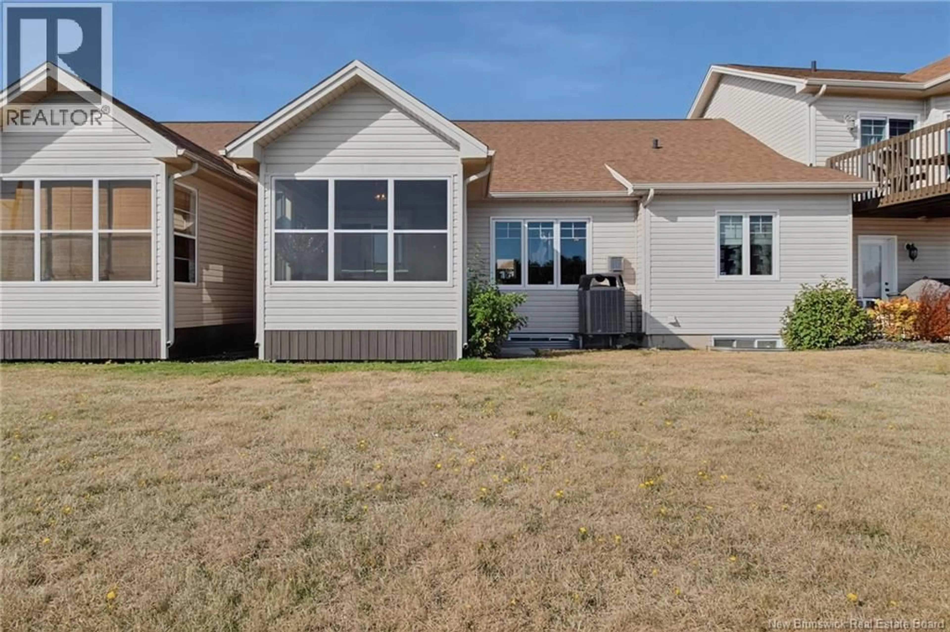 Home with vinyl exterior material, street for 118 - 19 PERFECTION LANE, Dieppe New Brunswick E1A9H2