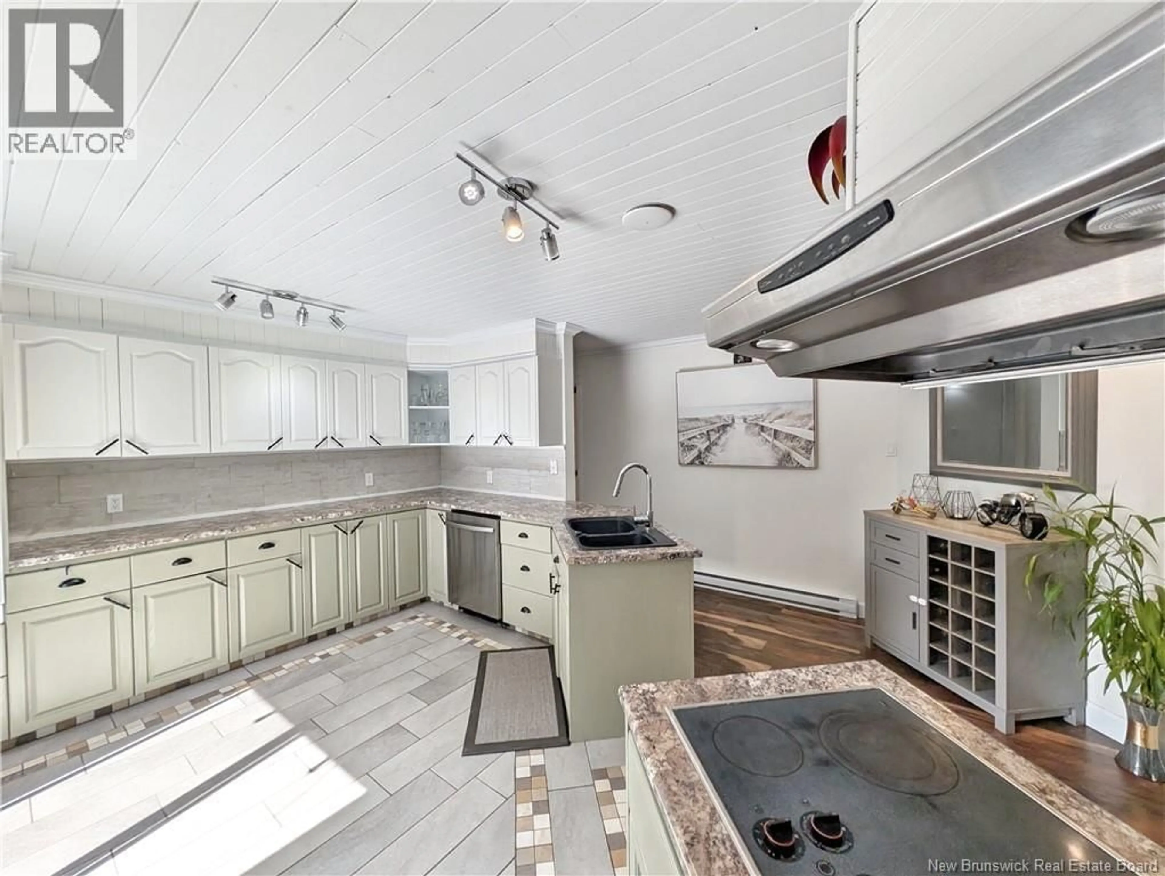 Open concept kitchen, ceramic/tile floor for 11185 NB 11, Pokemouche New Brunswick E8P1H8