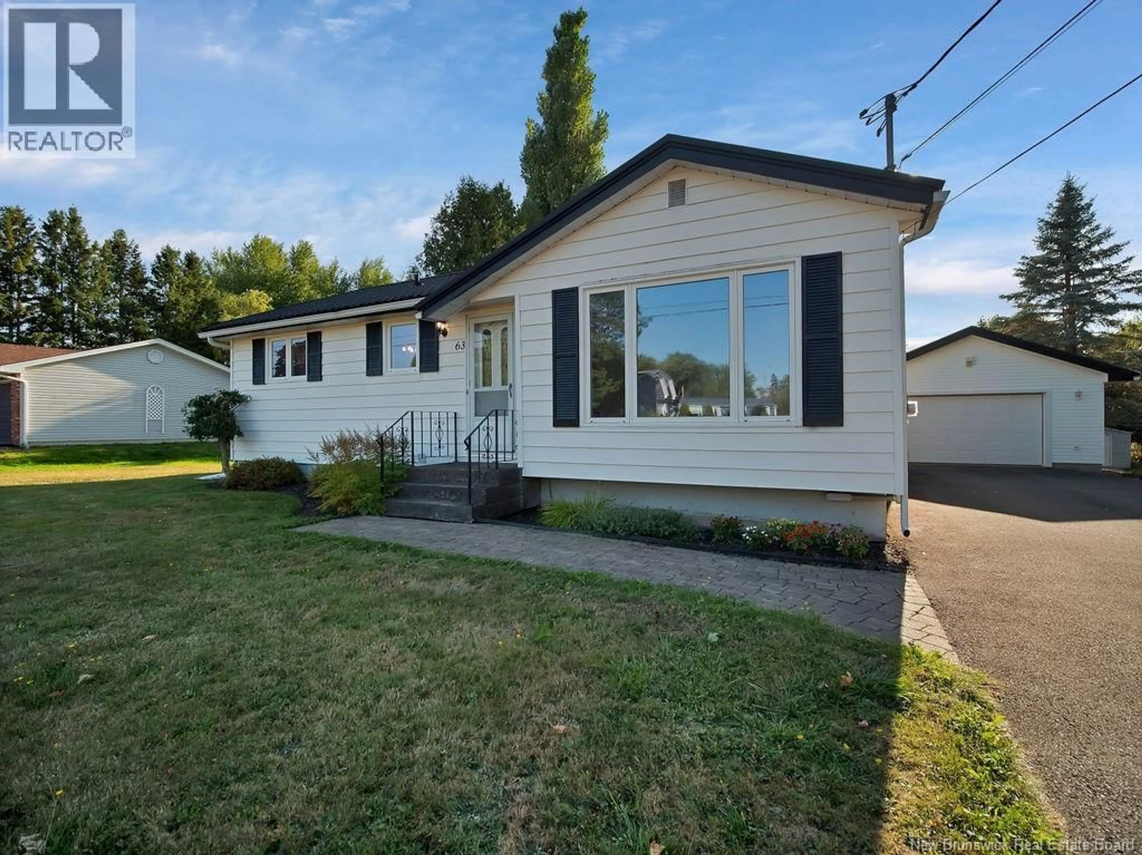 Home with vinyl exterior material, street for 63 GERMAINE STREET, Shediac New Brunswick E4P1T5