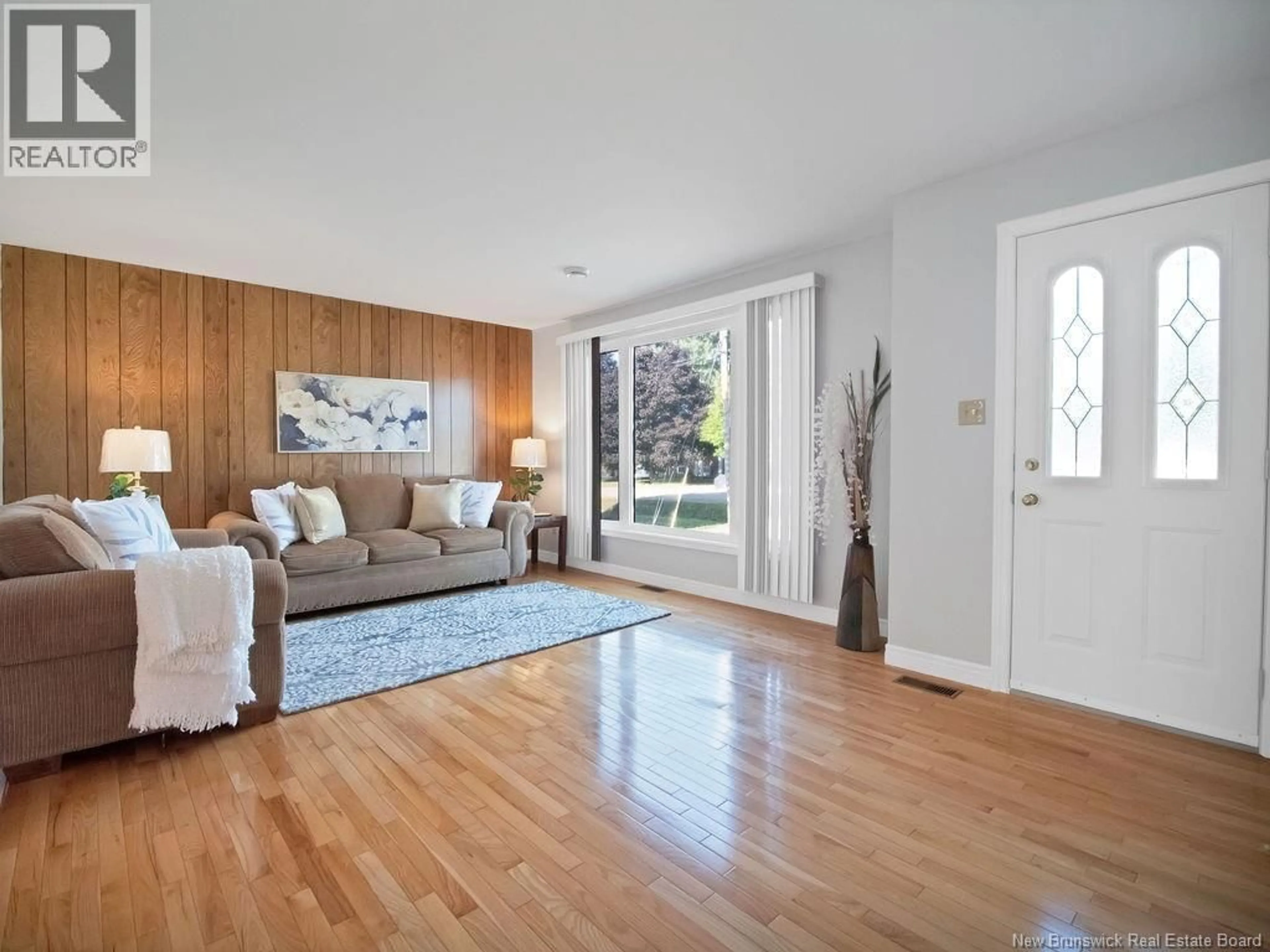 Living room with furniture, wood/laminate floor for 63 GERMAINE STREET, Shediac New Brunswick E4P1T5