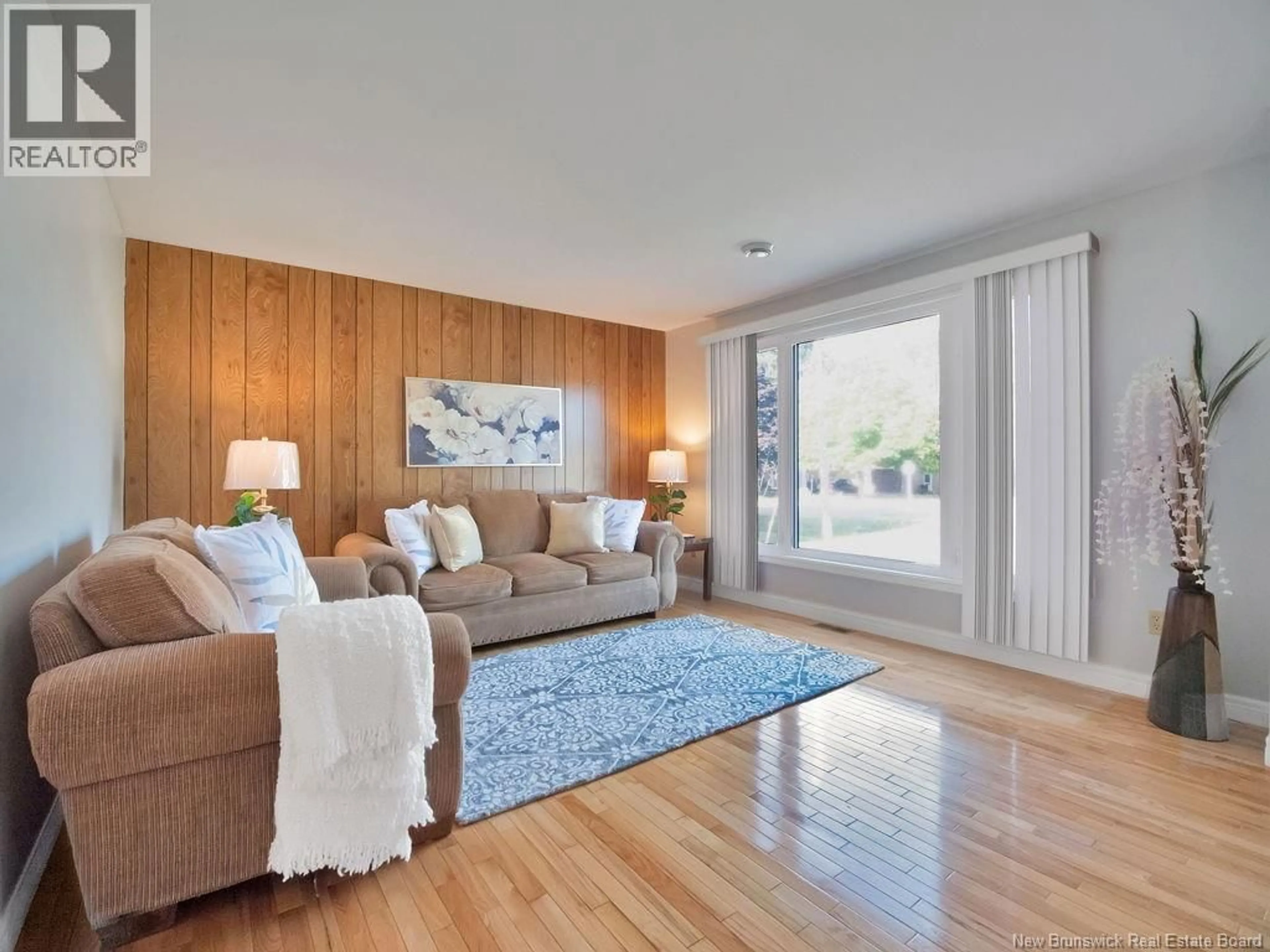 Living room with furniture, wood/laminate floor for 63 GERMAINE STREET, Shediac New Brunswick E4P1T5