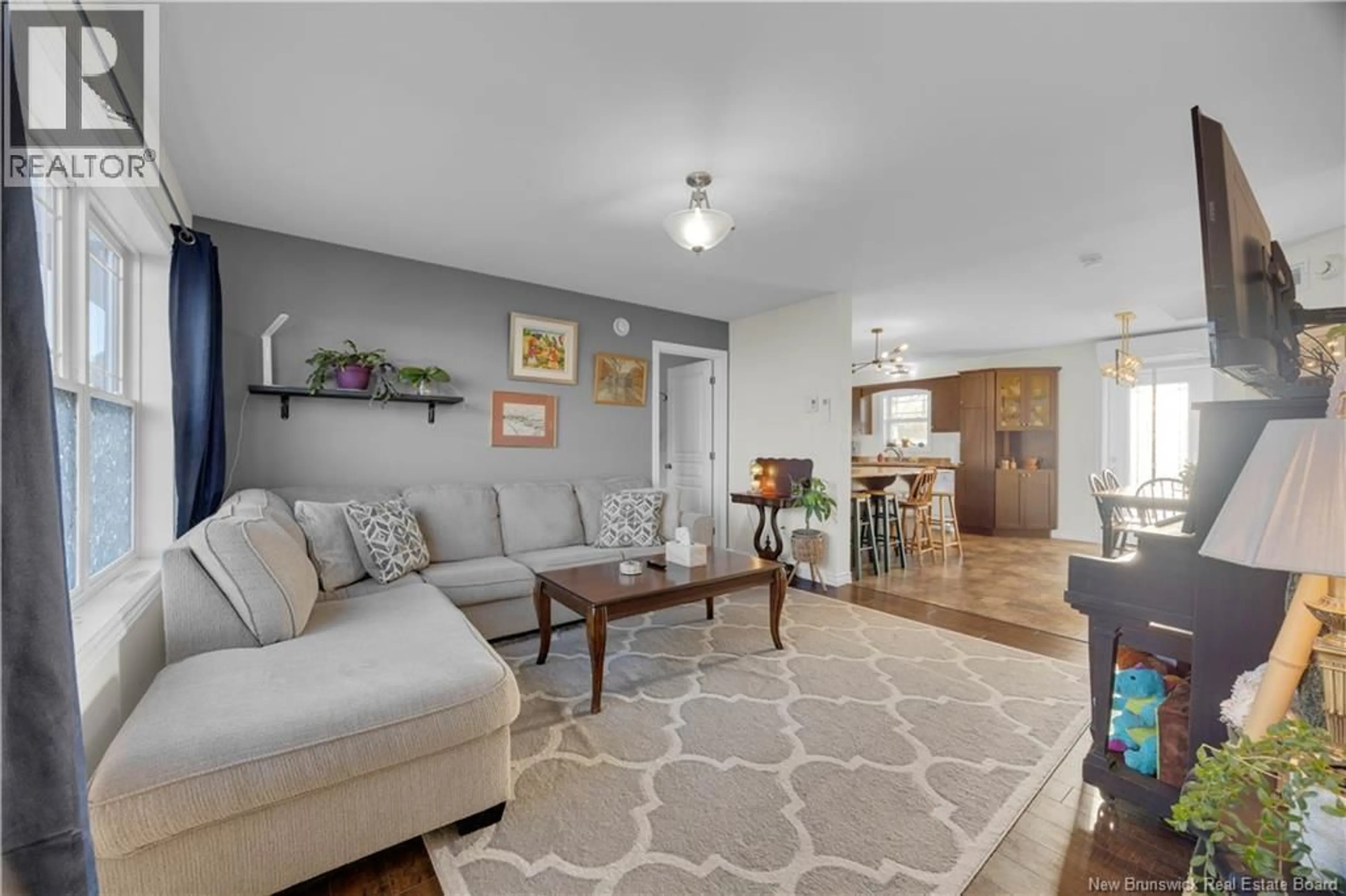 Living room with furniture, unknown for 19 BERMUDA COURT, Saint John New Brunswick E2J0G8