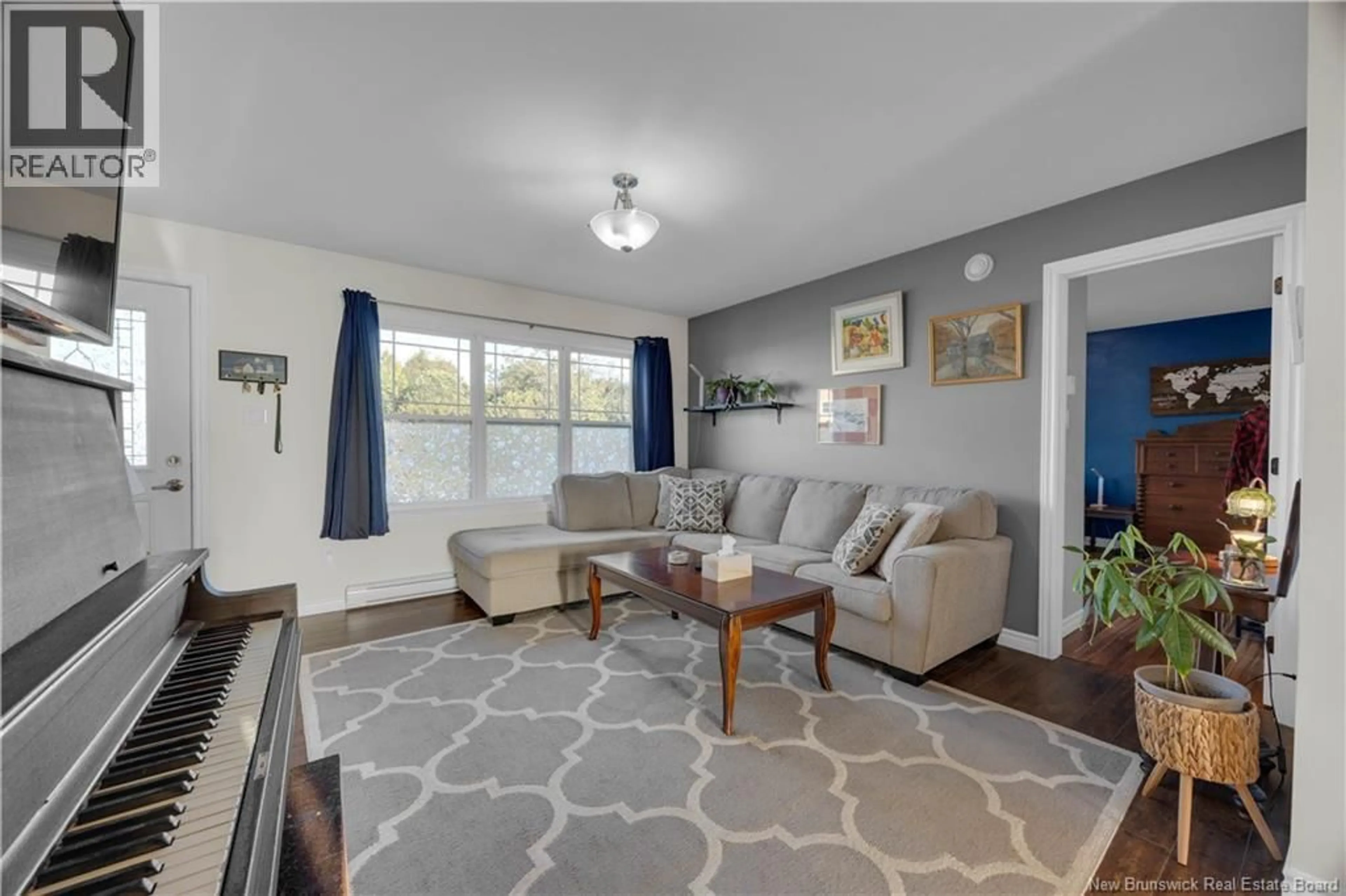 Living room with furniture, unknown for 19 BERMUDA COURT, Saint John New Brunswick E2J0G8