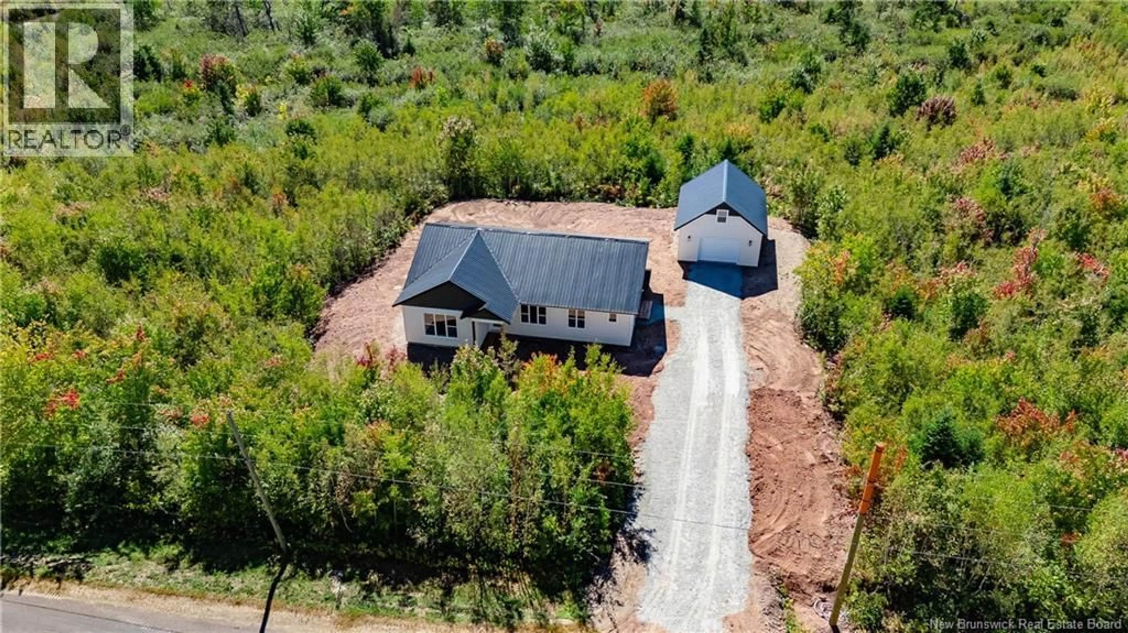 A pic from outside/outdoor area/front of a property/back of a property/a pic from drone, unknown for 106 WEBB ROAD, Tracy New Brunswick E5L1L6