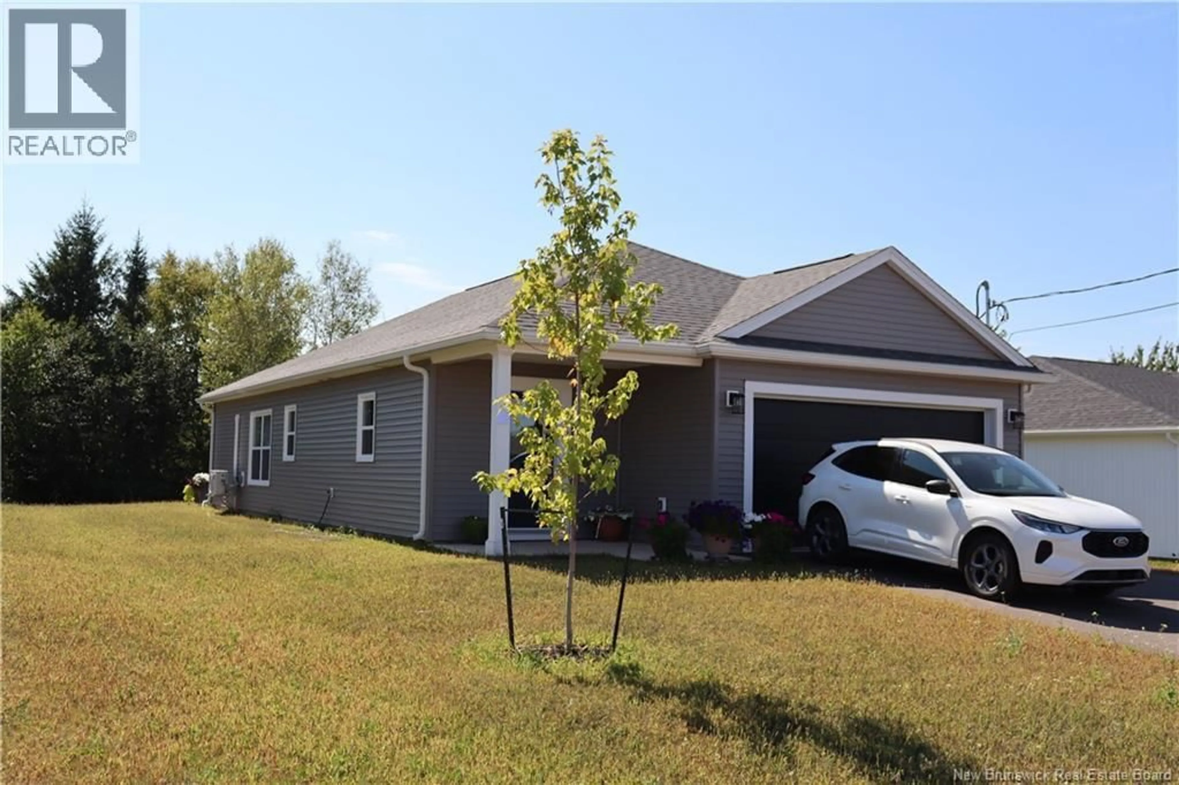 Home with vinyl exterior material, unknown for 40 BUCHANAN DRIVE, Sussex Corner New Brunswick E4E0B6